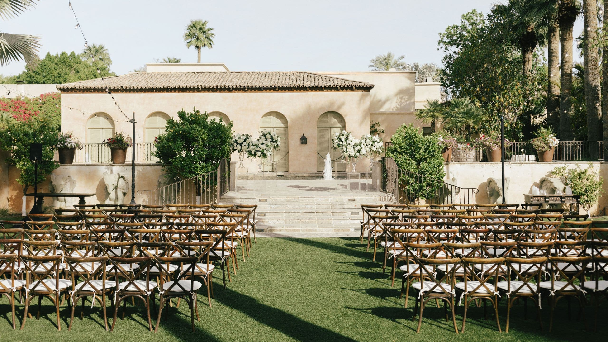 1 of 7 Royal Palms Resort and Spa Vernadero Lawn Wedding Ceremony Glass Pillars
