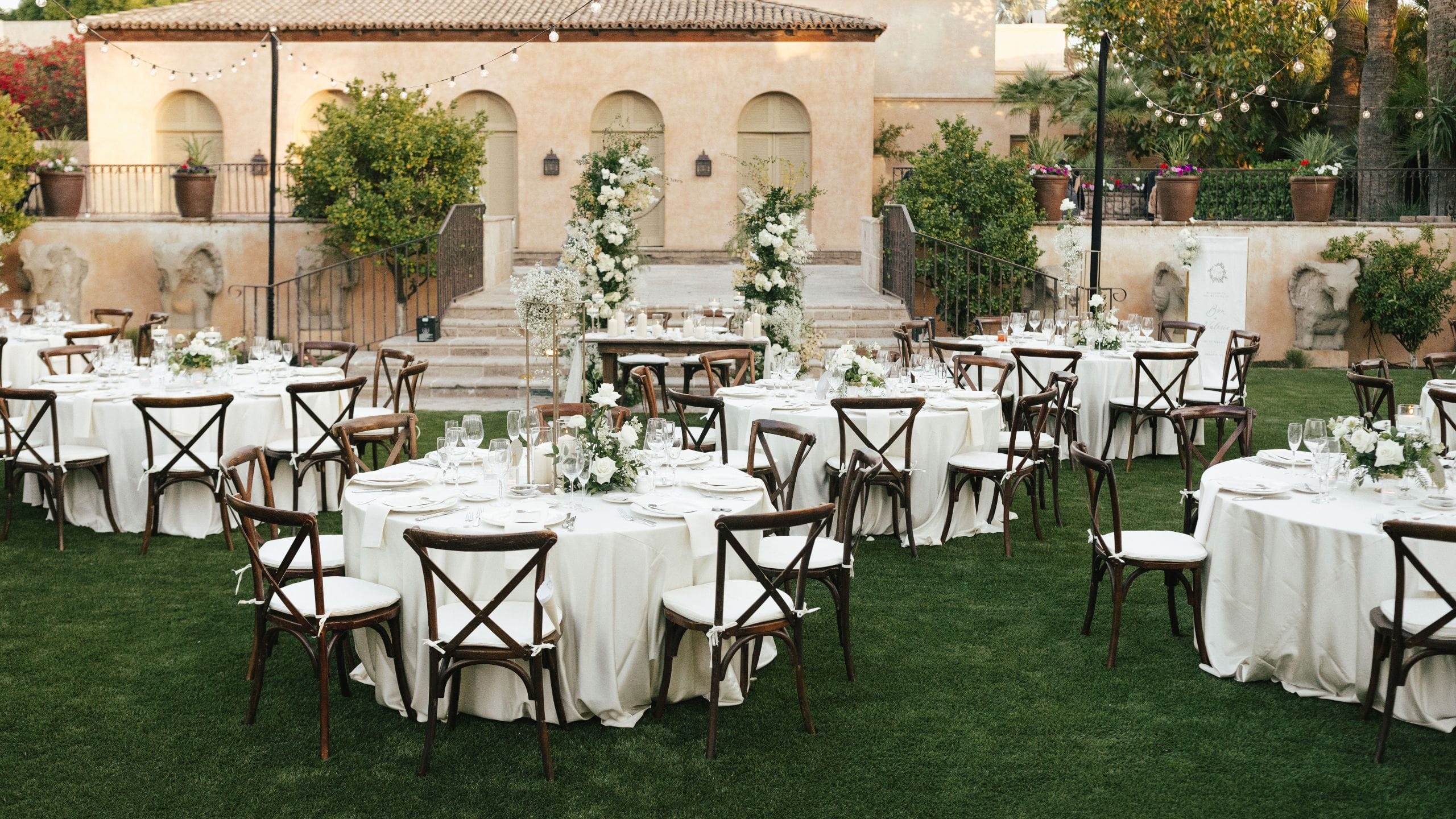 2 of 7 Royal Palms Resort and Spa Vernadero Lawn Wedding Reception White Roses