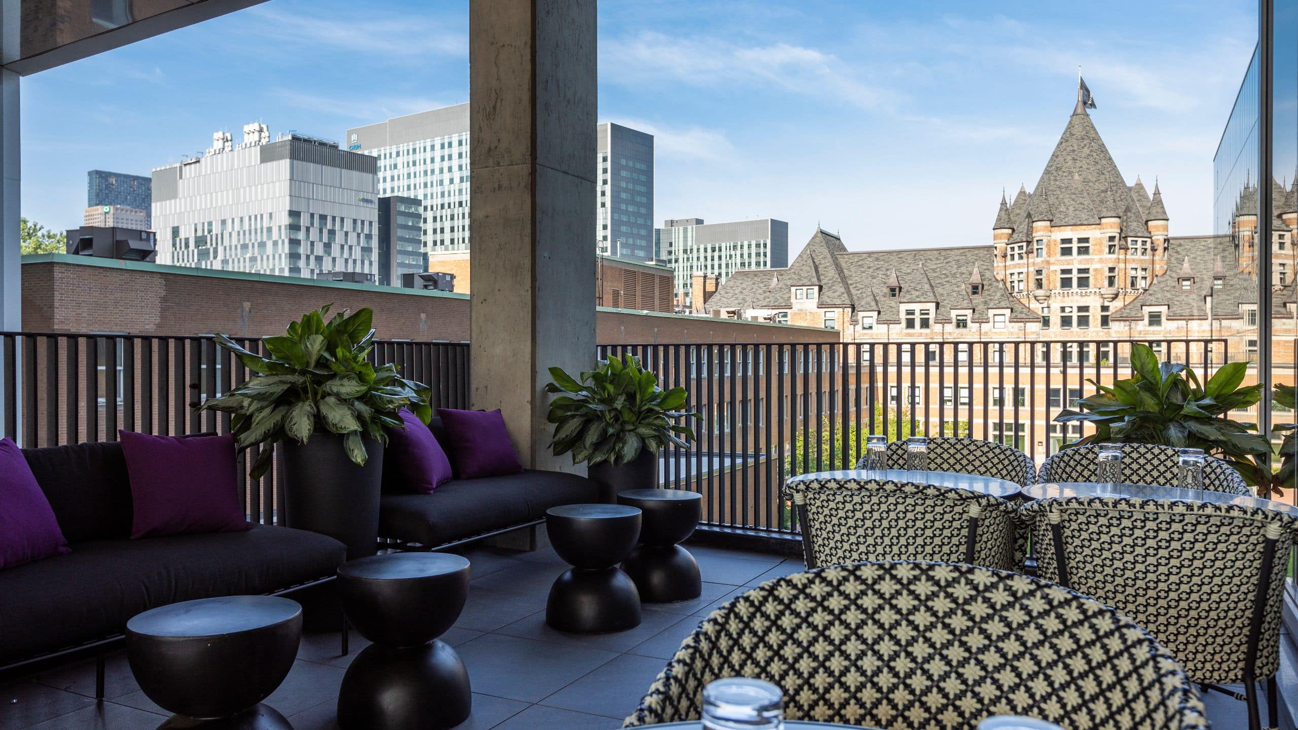 7 of 9 Hyatt Centric Montreal Pub Cartier Arms Seating Area