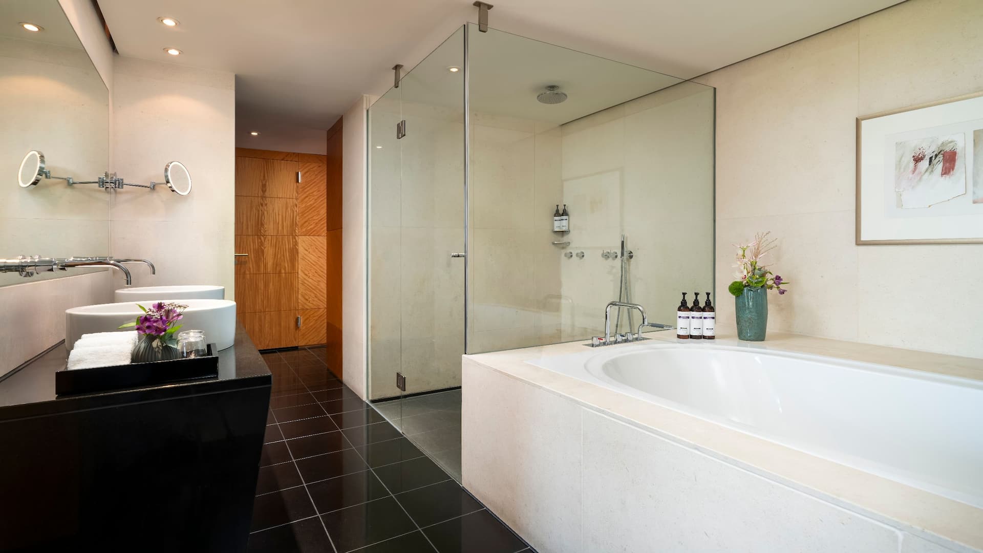 Marble bathroom with a large tub and walk in shower in Presidential Suite at Hyatt Regency Mainz