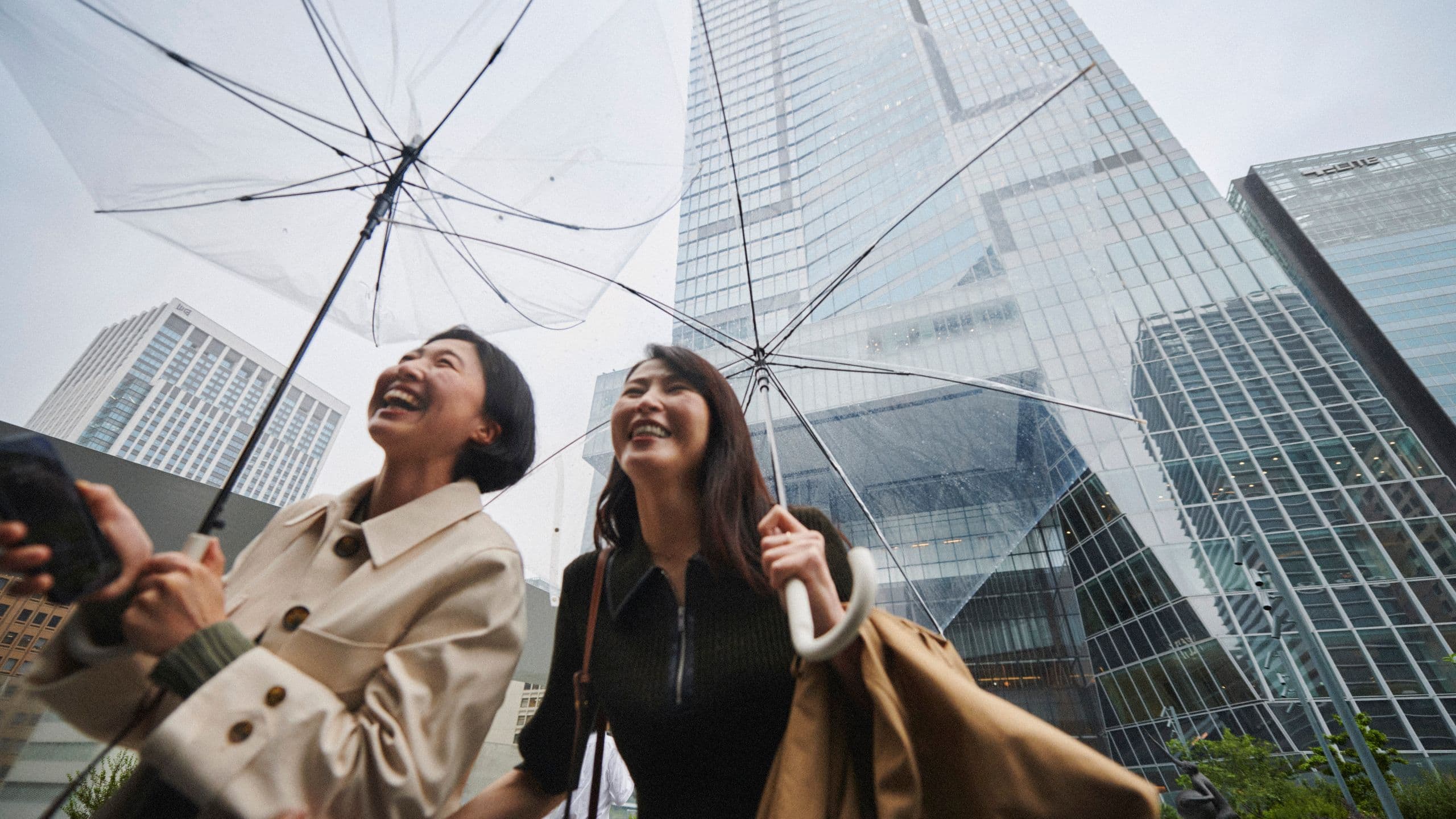 World of Hyatt 2024 Tokyo Bridge Exterior Women Rain Umbrella Laughing