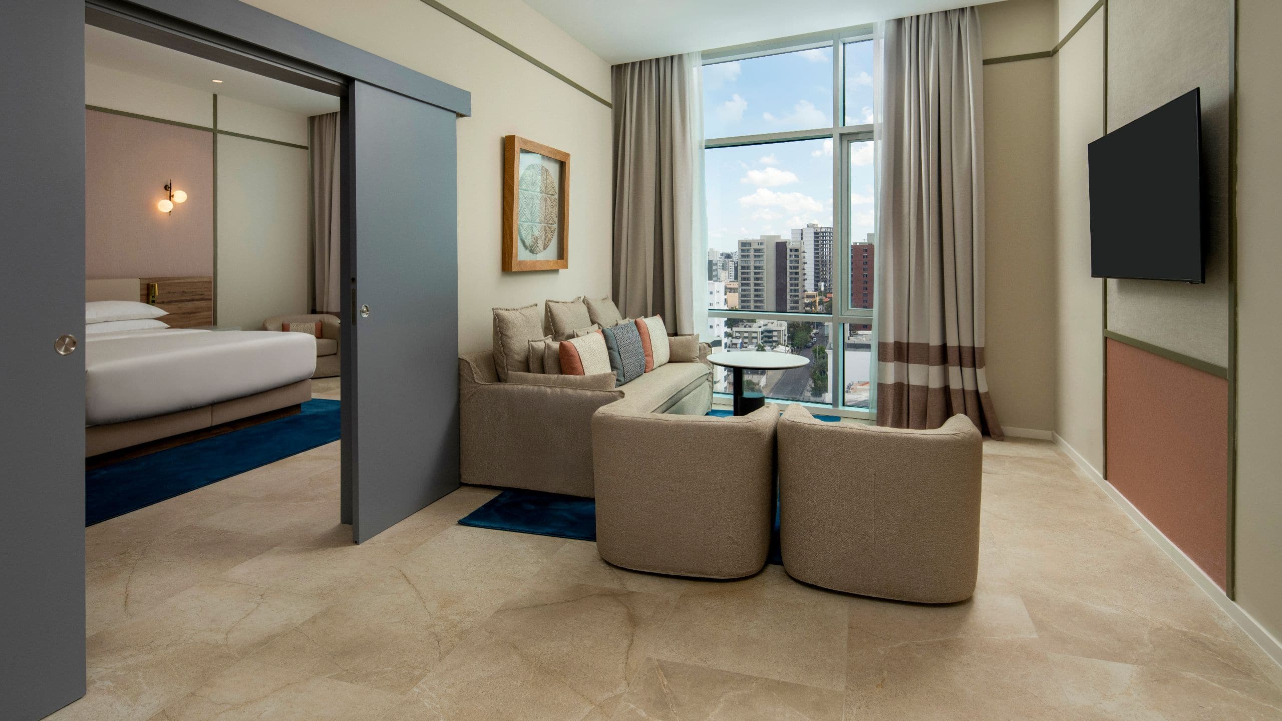 1 of 8 Hyatt Centric Santo Domingo Premier Suite Living Room And Bedroom