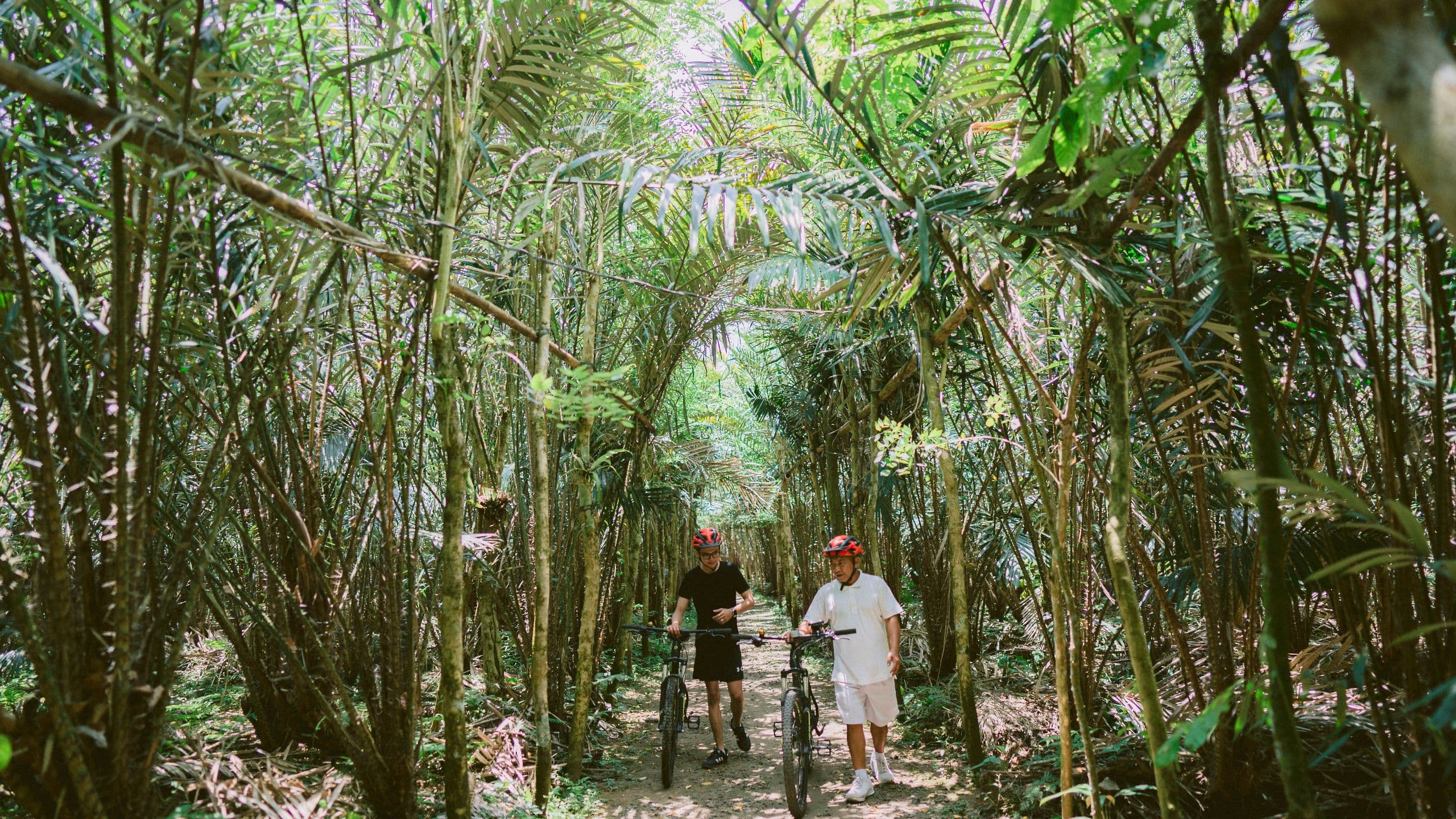 Alila Manggis Pedal Past Snake Fruit Trees