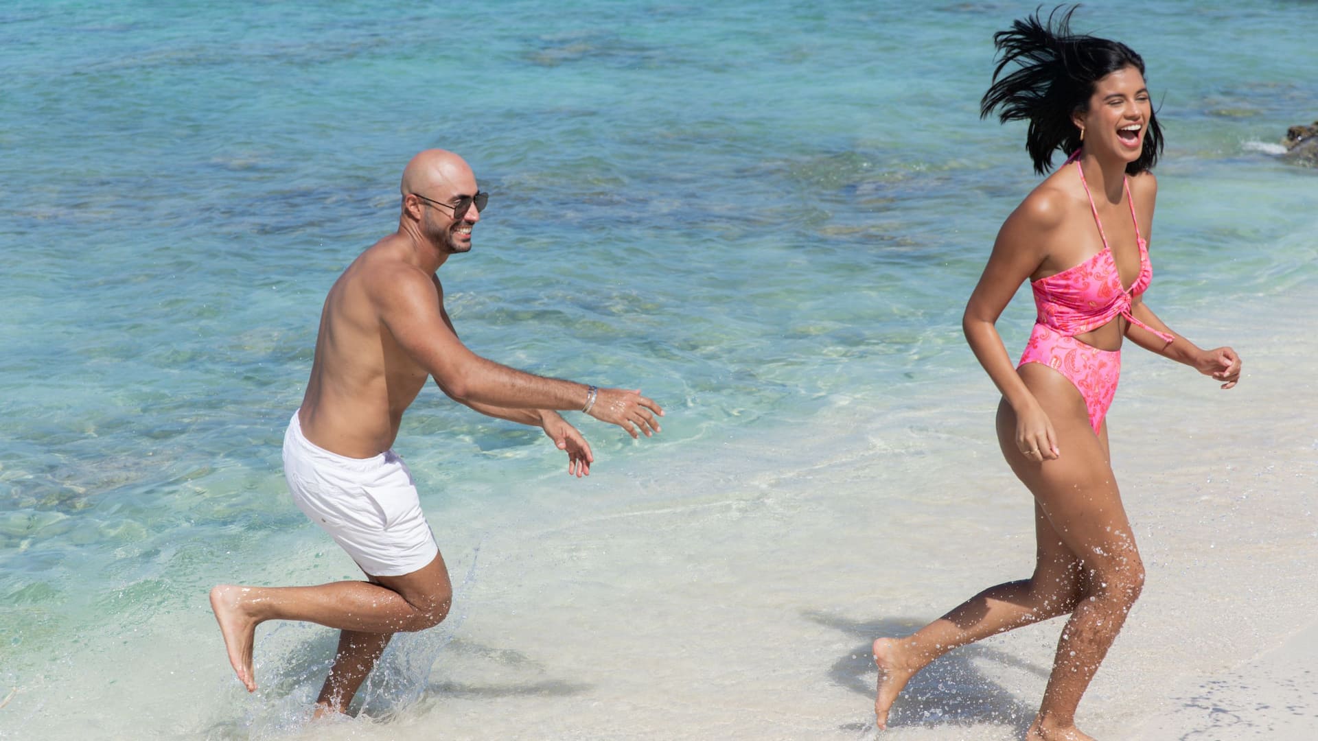 Hyatt Regency Aruba Resort Spa and Casino Couple Playing On The Beach
