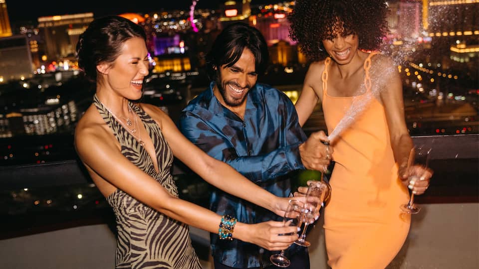 Guests Popping Champagne Voodoo Lounge