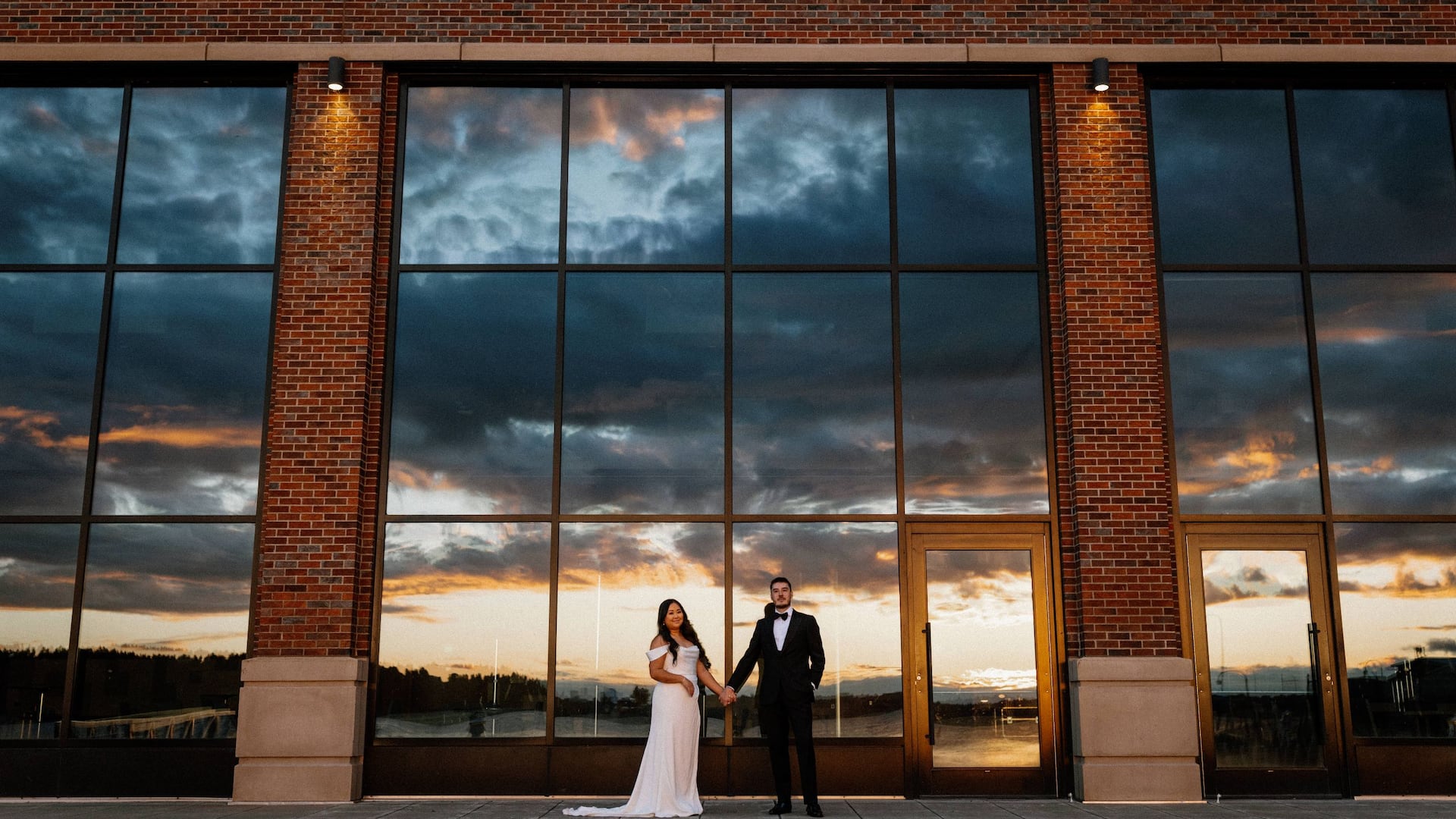 Hyatt Regency Lake Washington at Seattle's Southport Bride And Groom In Front Of Windows