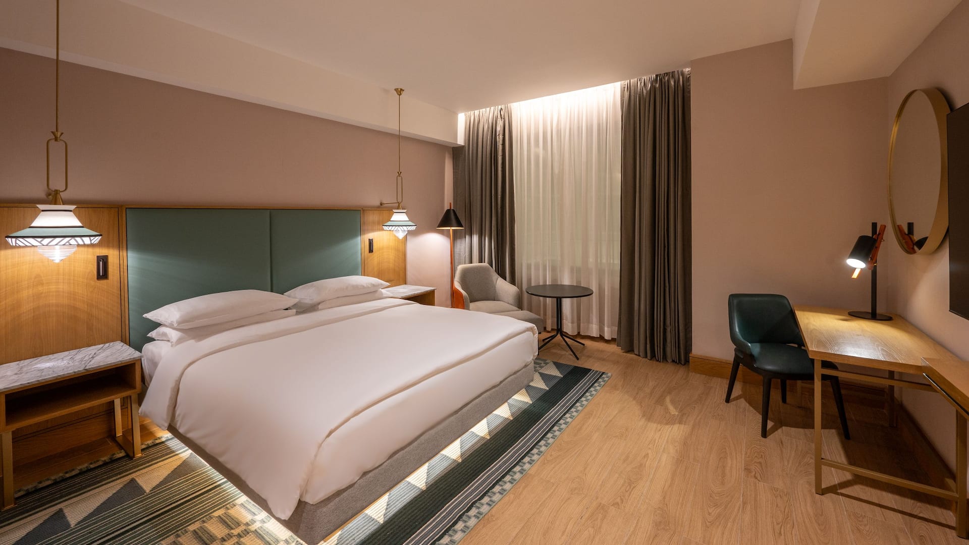 1/5 Deluxe studio apartment comprising of a king bed, working station, contemporary décor ideal for business travelers.