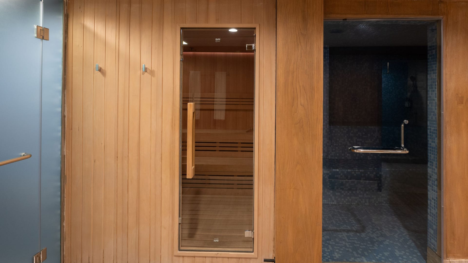 StayFit gym fully equipped with modern workout equipment and floor-to-ceiling mirrors.