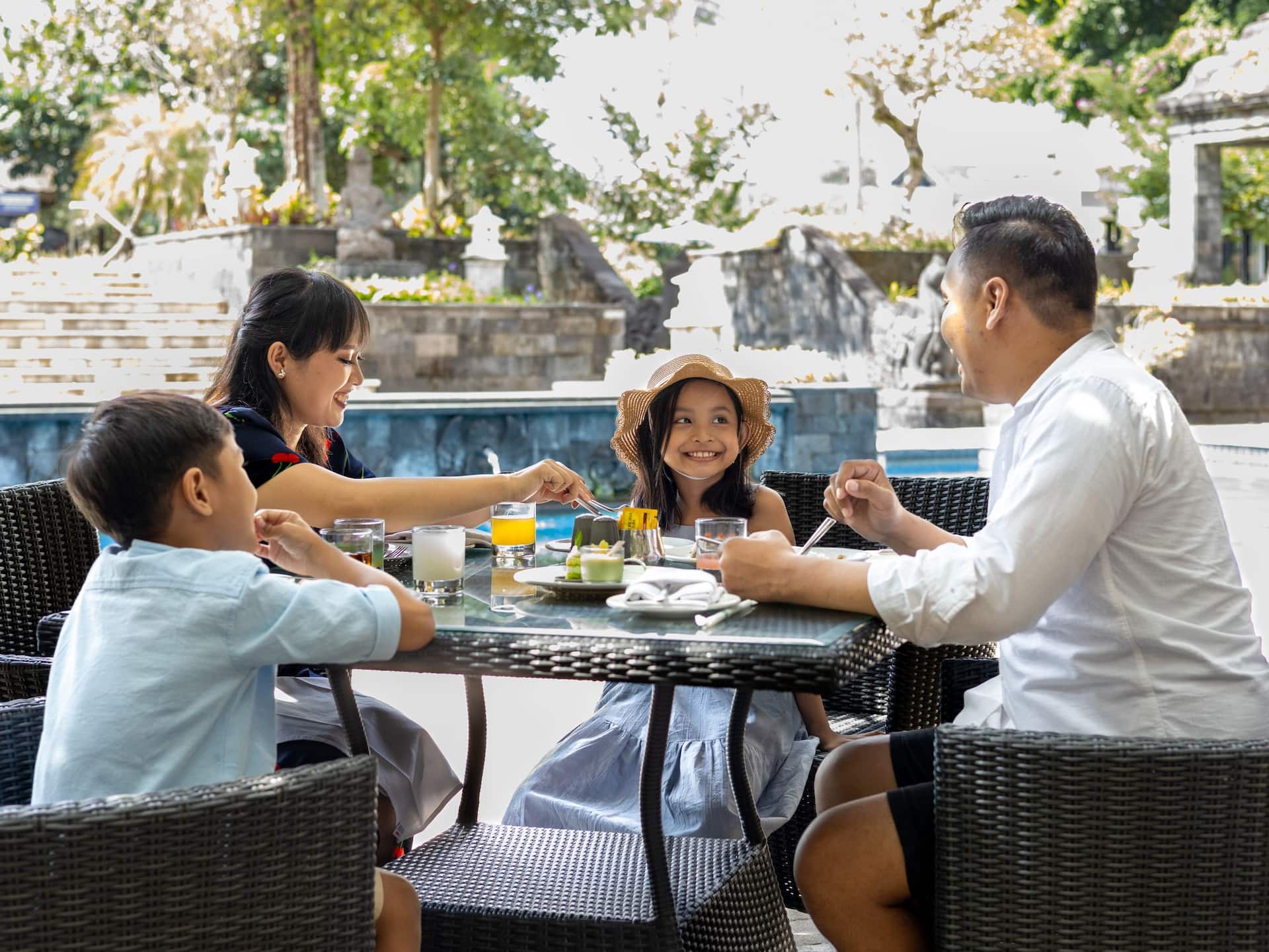 Hyatt Regency Yogyakarta Family Enjoying Sunday Brunch Landscape