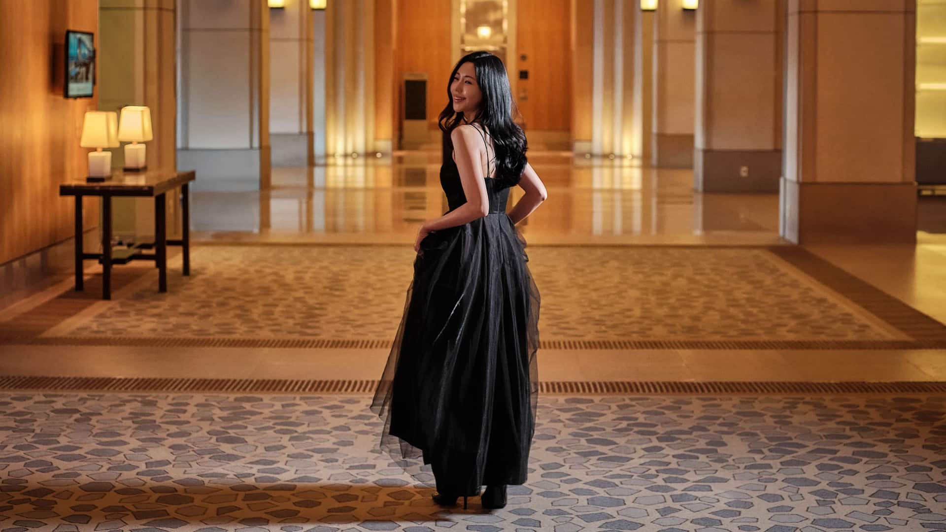 Grand Hyatt Incheon Woman In A Dress Looking Back