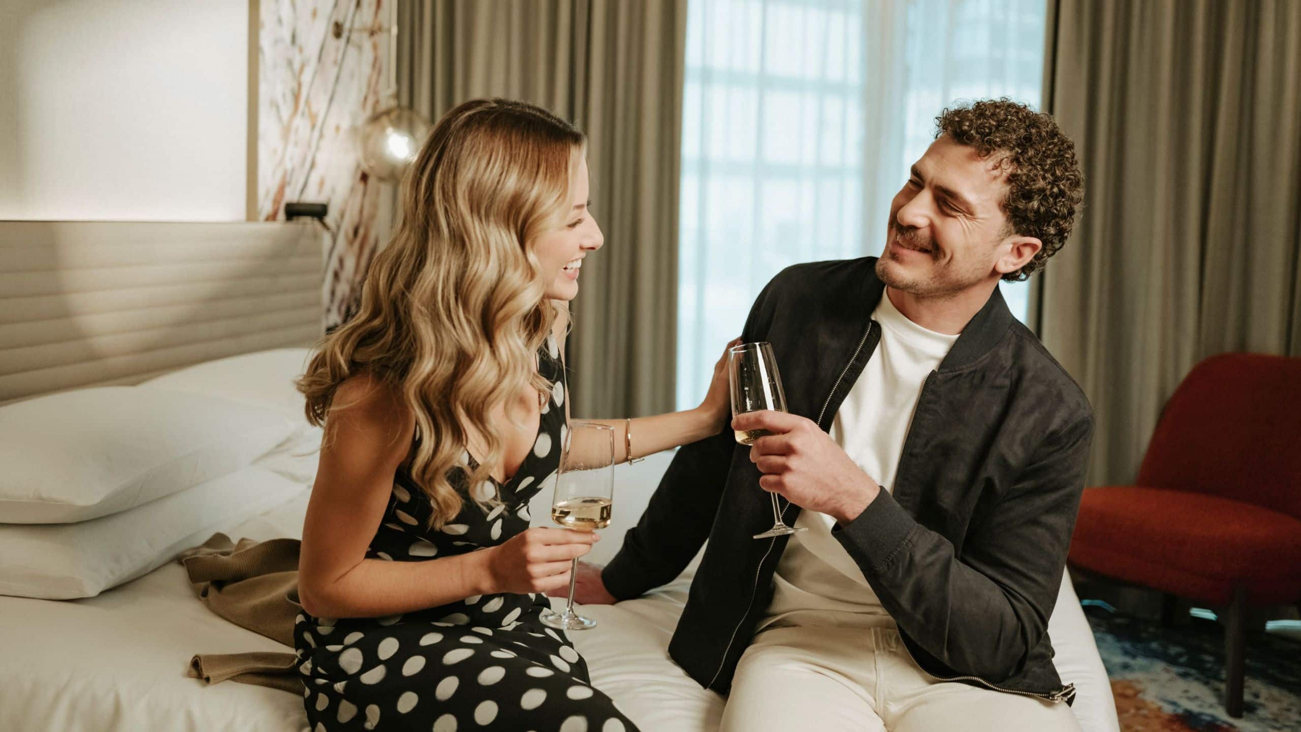 Hyatt Centric Malta Couple Drinking Champagne In The Room