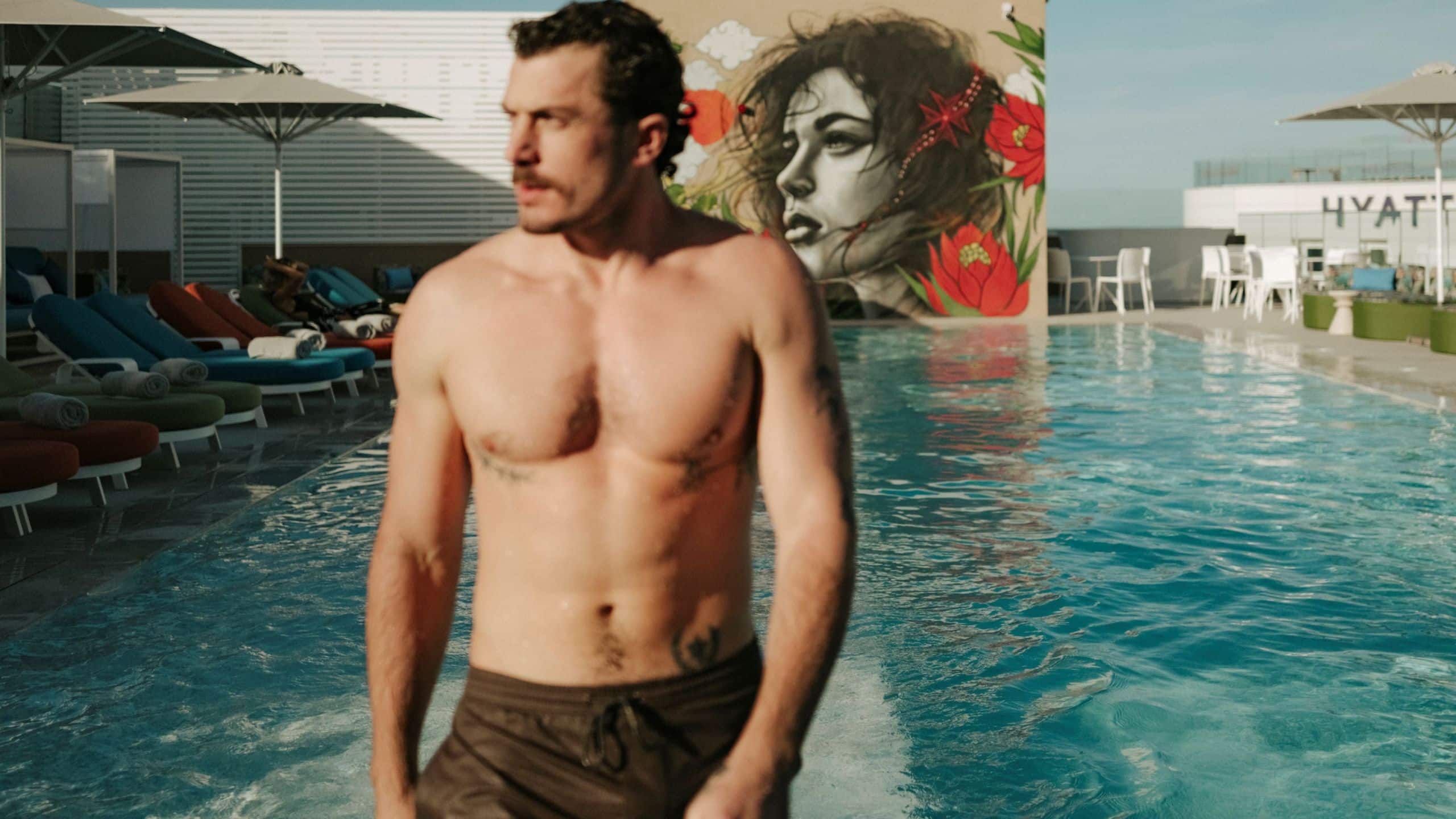 Hyatt Centric Malta Men Coming Out Of Pool Rooftop