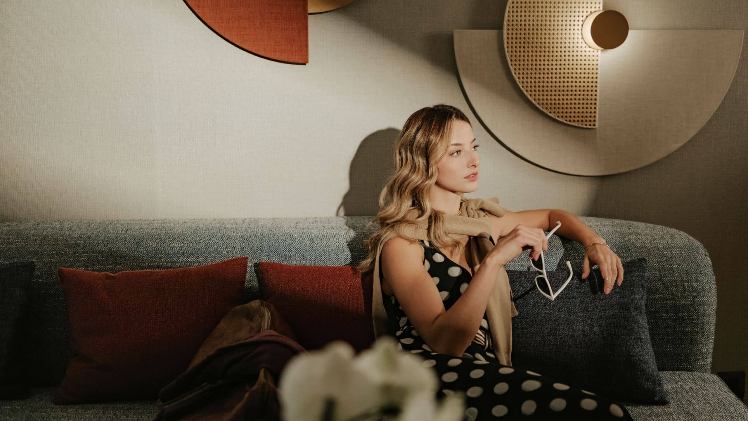 7/8 Hyatt Centric Malta Woman Relaxing On Sofa