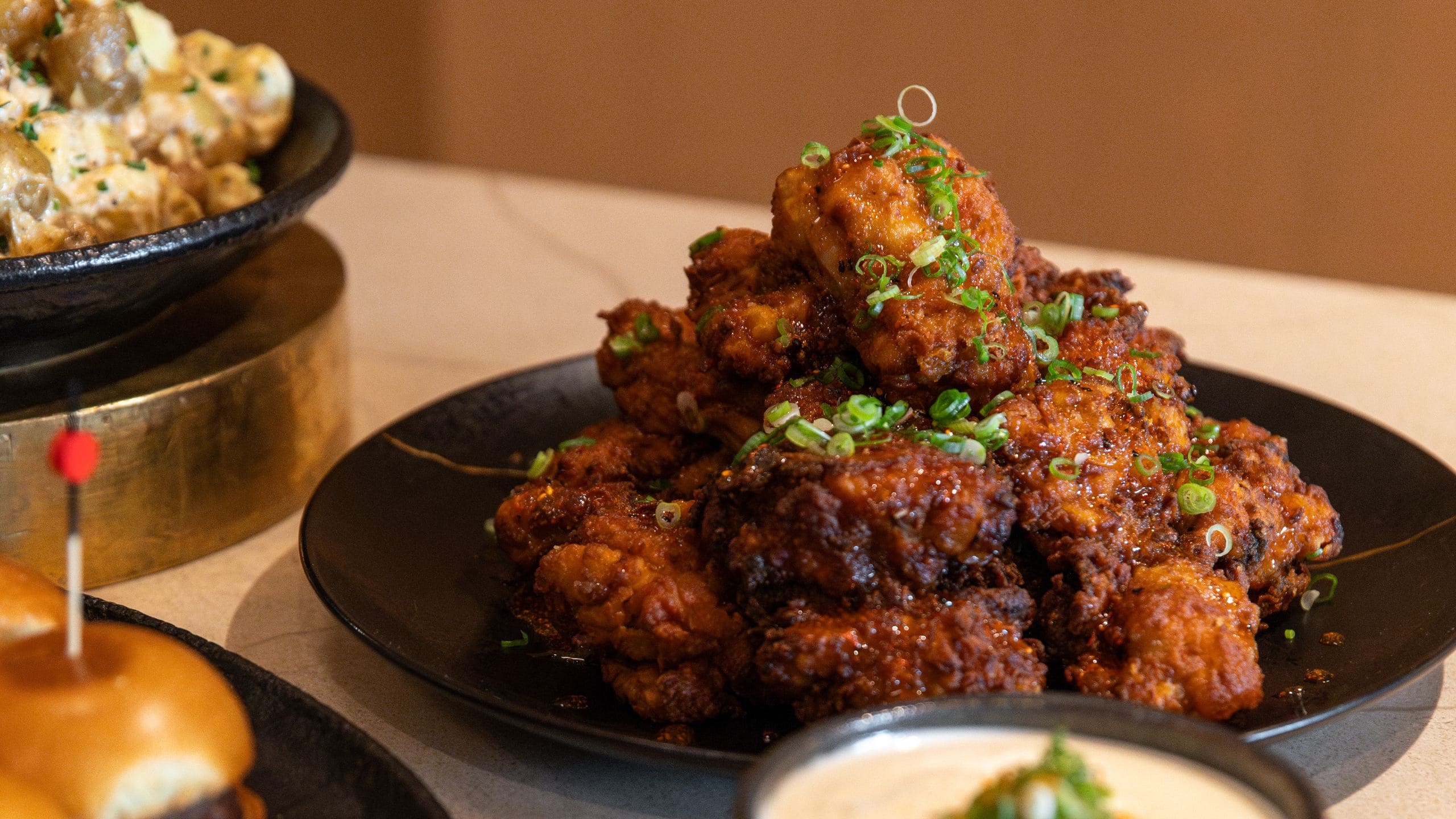Park Hyatt Chicago Close Up Of Chicken Wings And Burgers