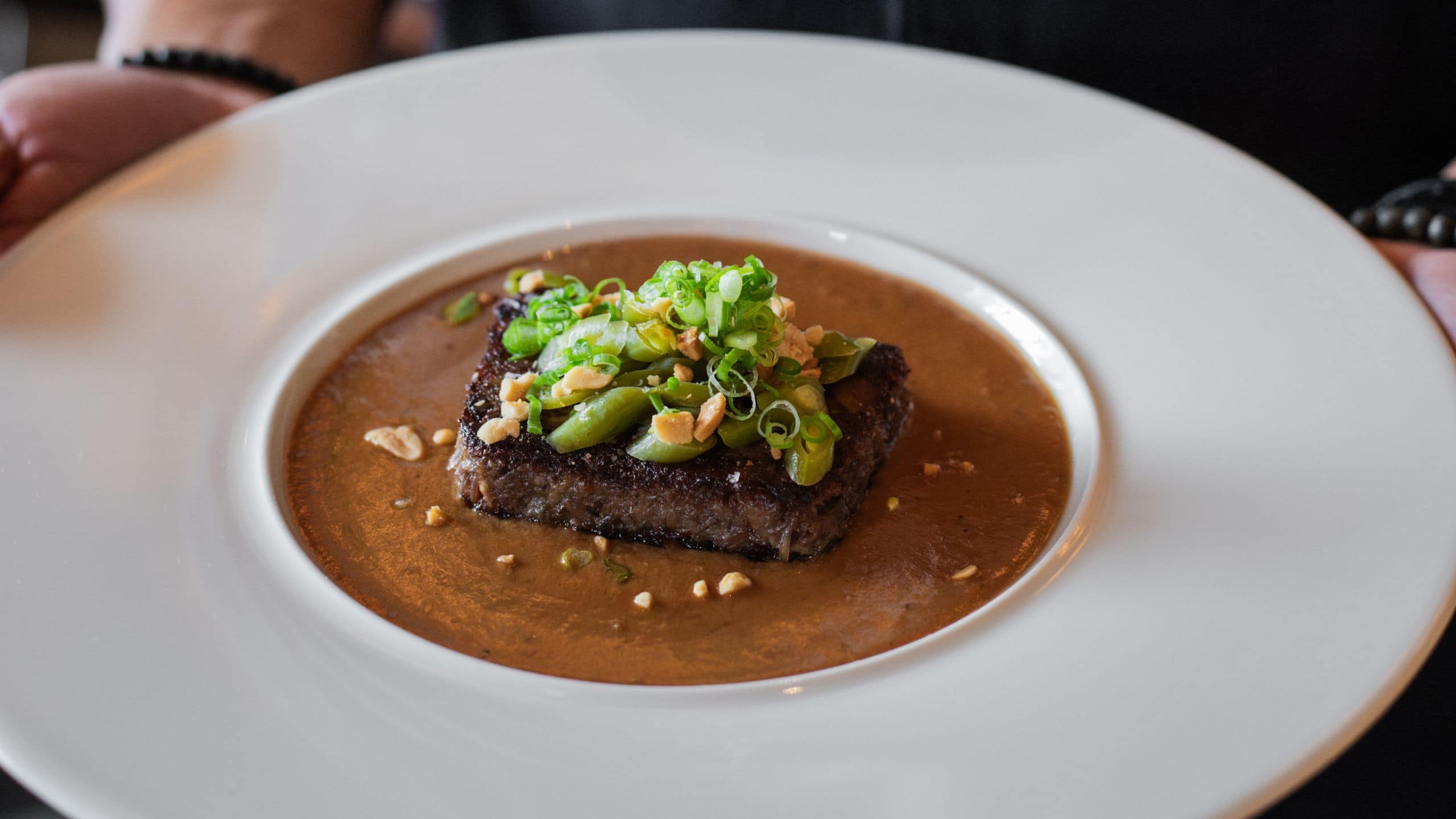 Park Hyatt Chicago Chef Holding Plate Oxtail Dish