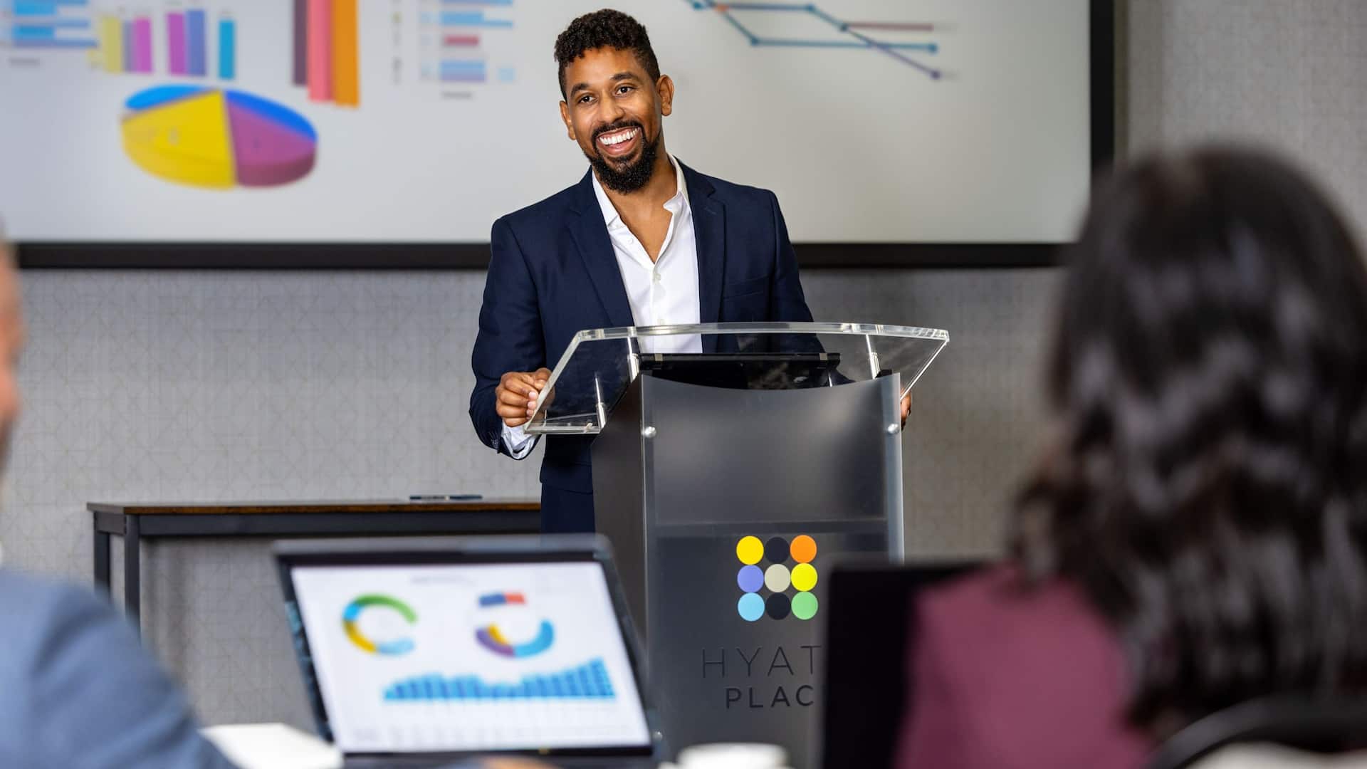 1 of 1 Hyatt Place HP_P0585 Business Meeting Man Podium Presentation