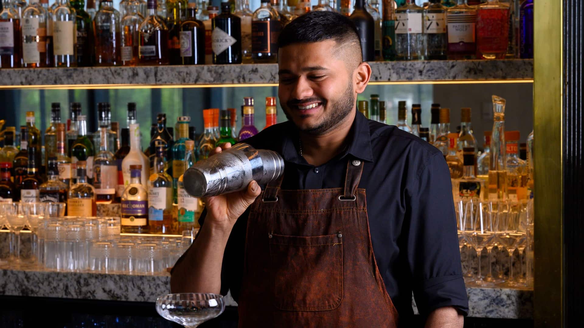 Hyatt Place Melbourne Caribbean Park Archies Farm Restaurant Bar Bartender Smiling