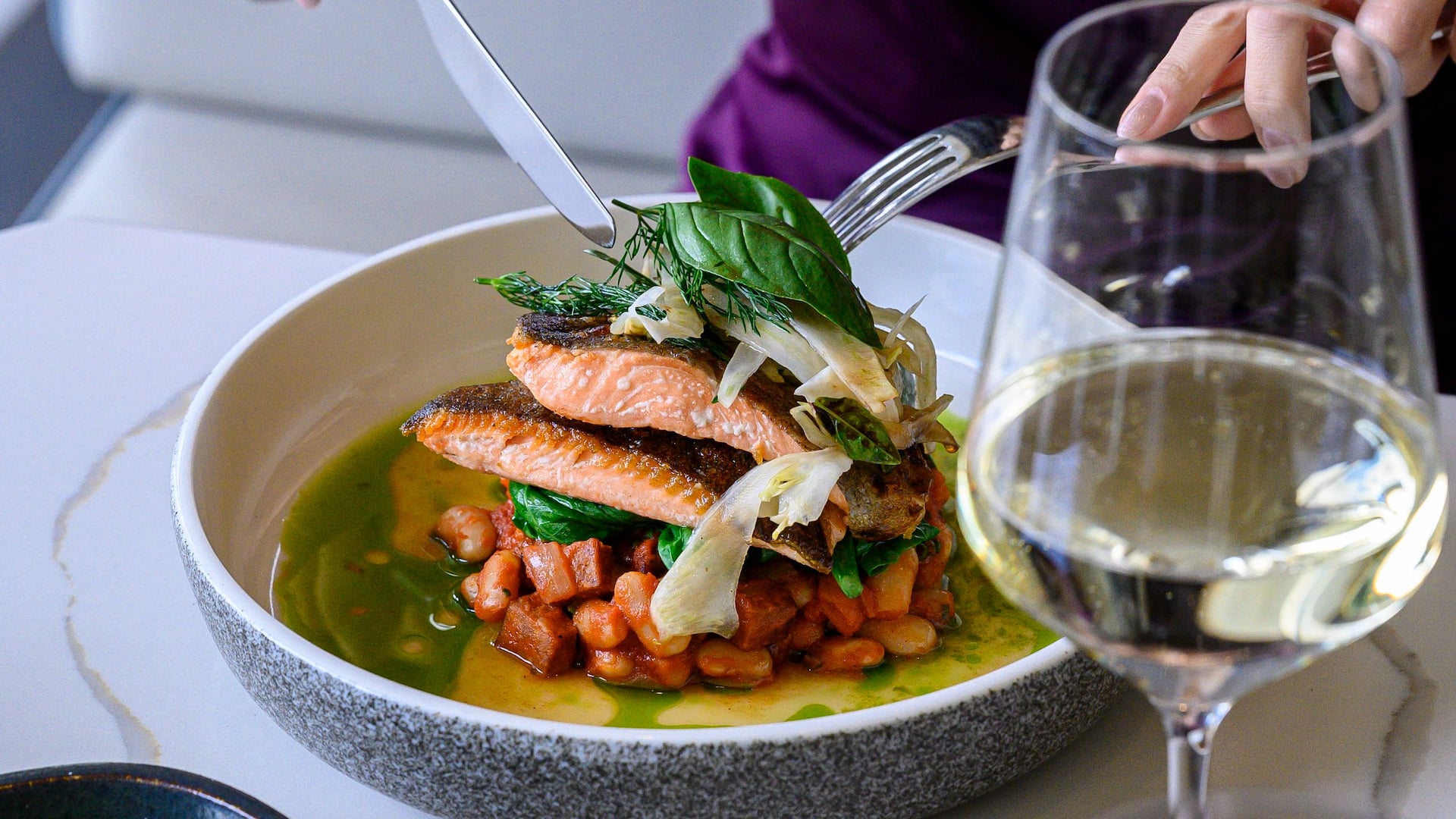 Hyatt Place Melbourne Caribbean Park Archies Farm Restaurant Bar Female Eating Salmon