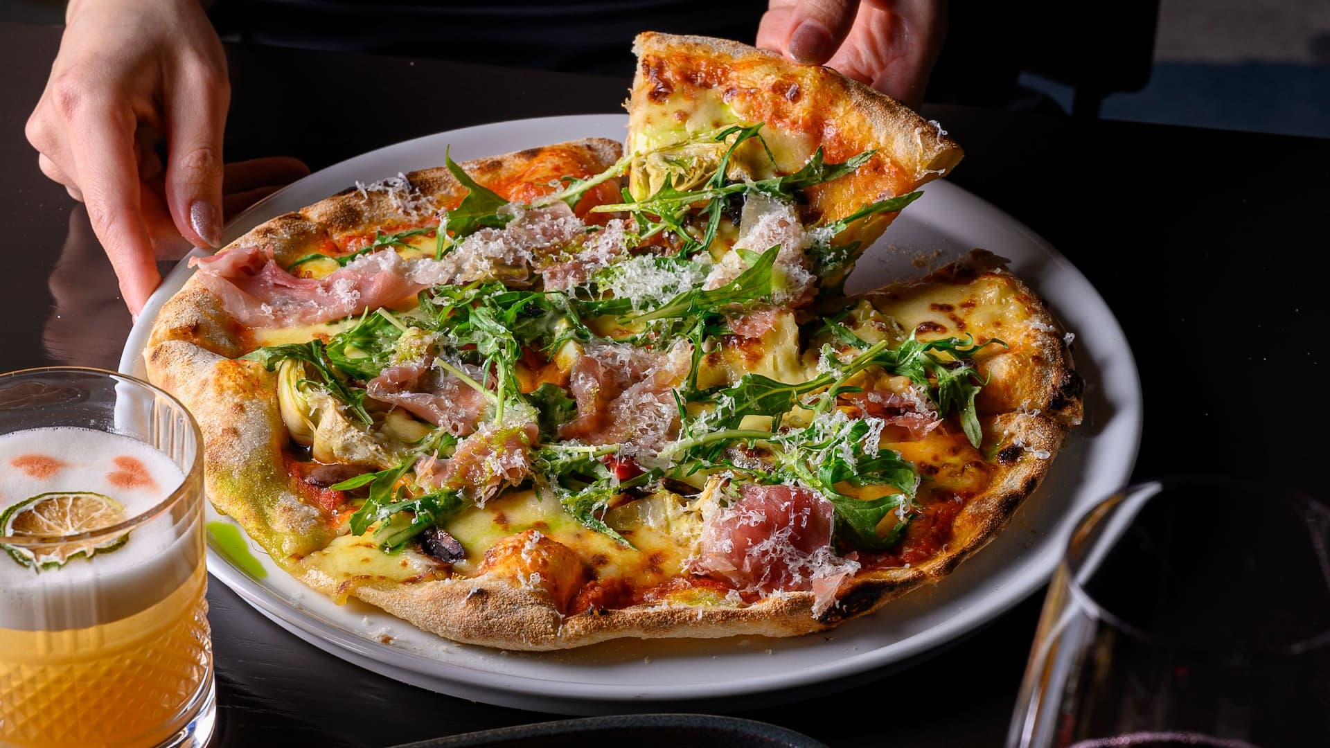 Hyatt Place Melbourne Caribbean Park Archies Farm Restaurant Bar Female Holding Pizza