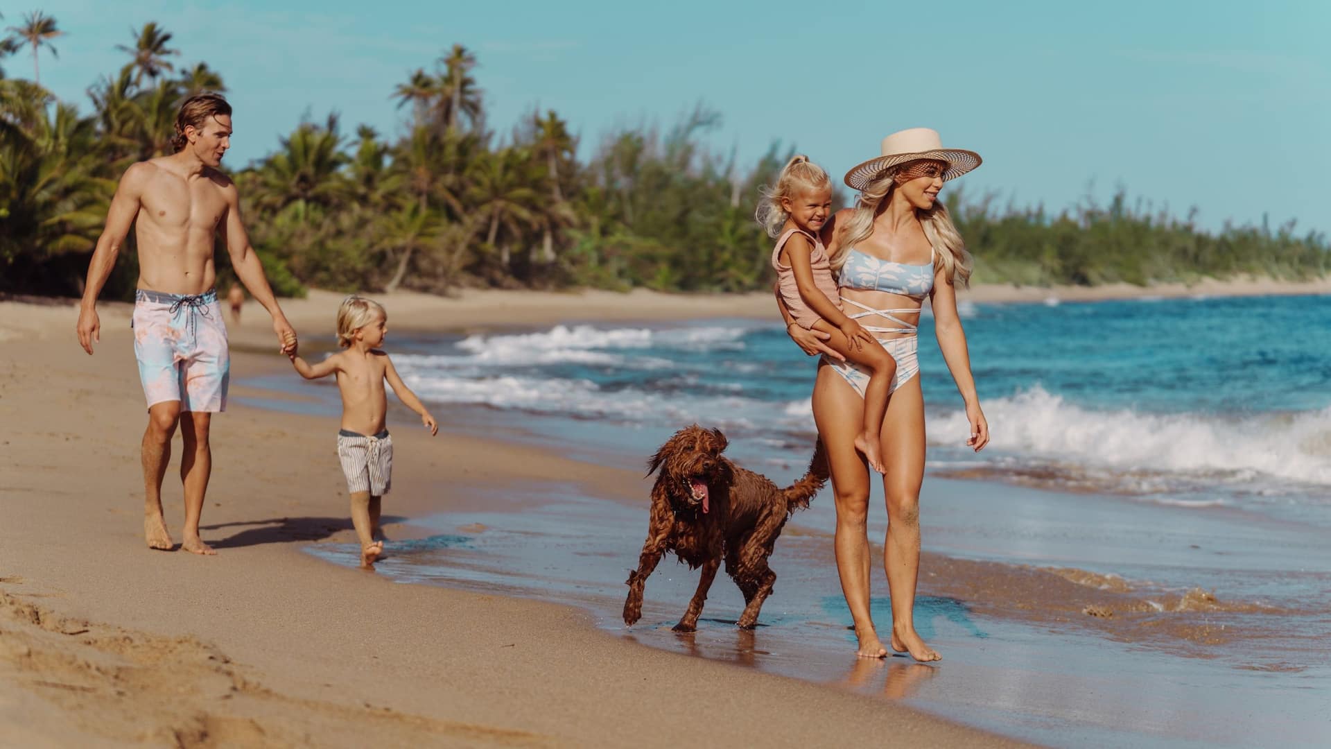 Hyatt Place Manatí Family at the Beach with the Dog