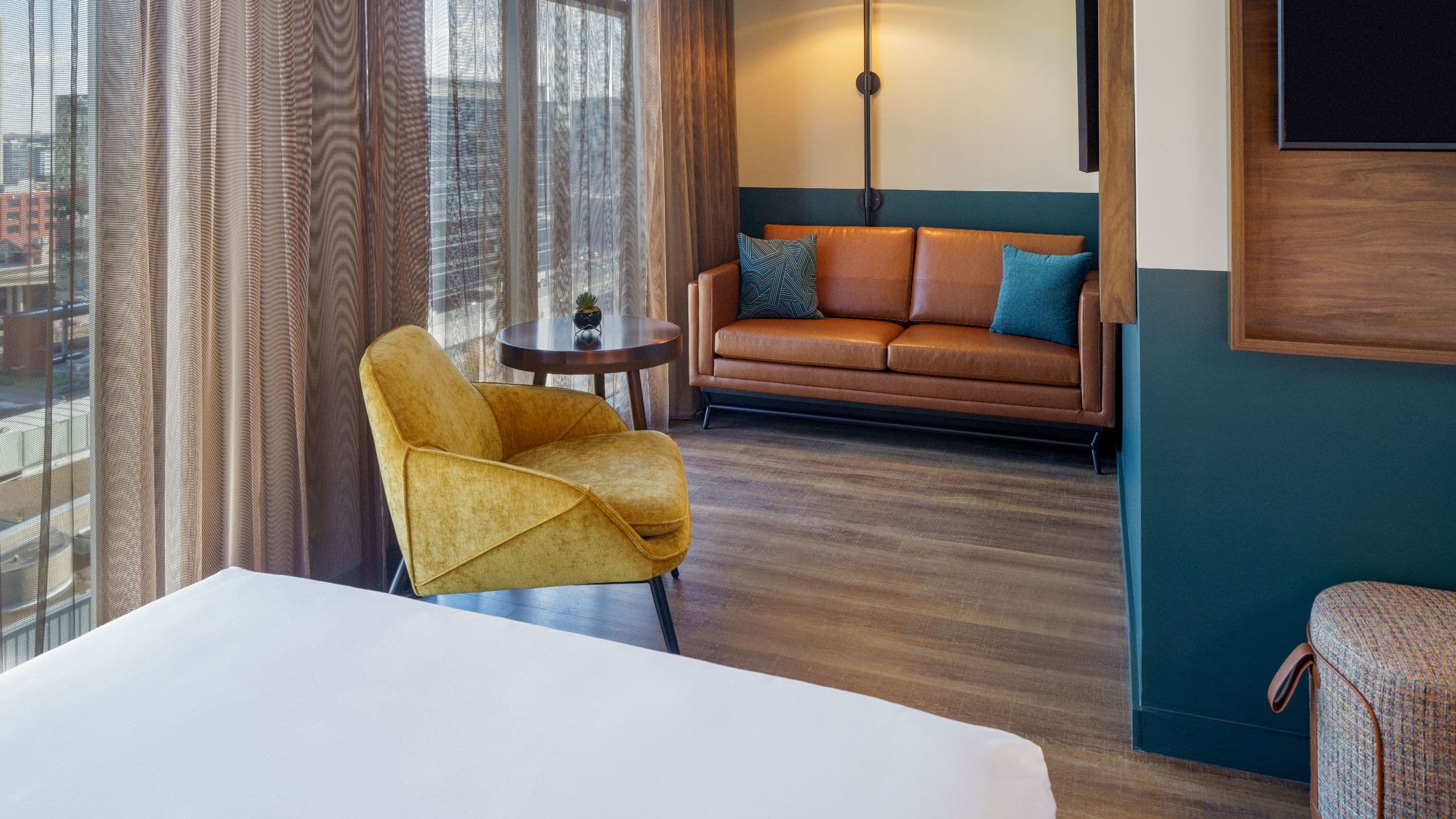 2 of 5 Caption by Hyatt Downtown Nashville Deluxe Double Sofa