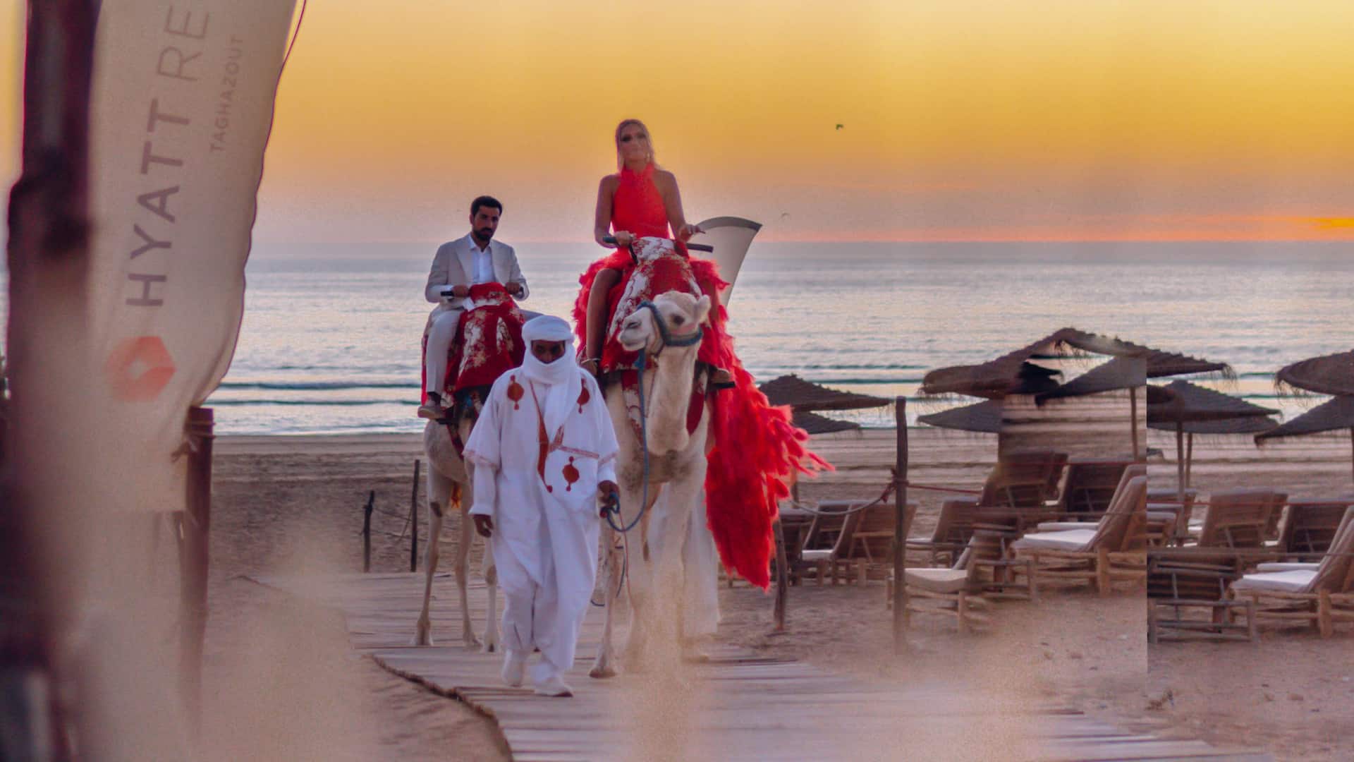 1 of 3 Hyatt Regency Taghazout Wedding Camel Ride Entry Bride And Groom2