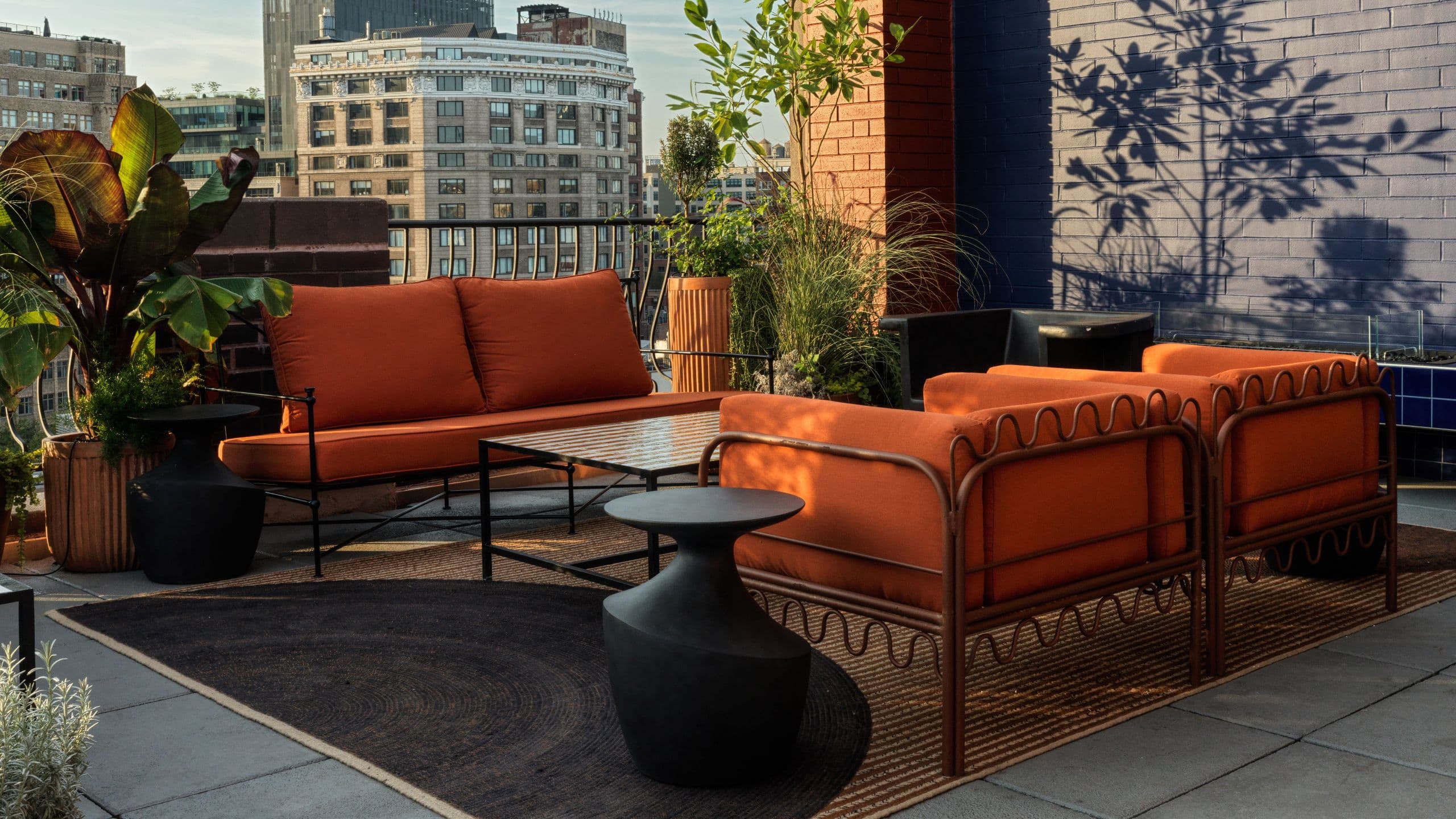 The Manner Rooftop Orange Couches