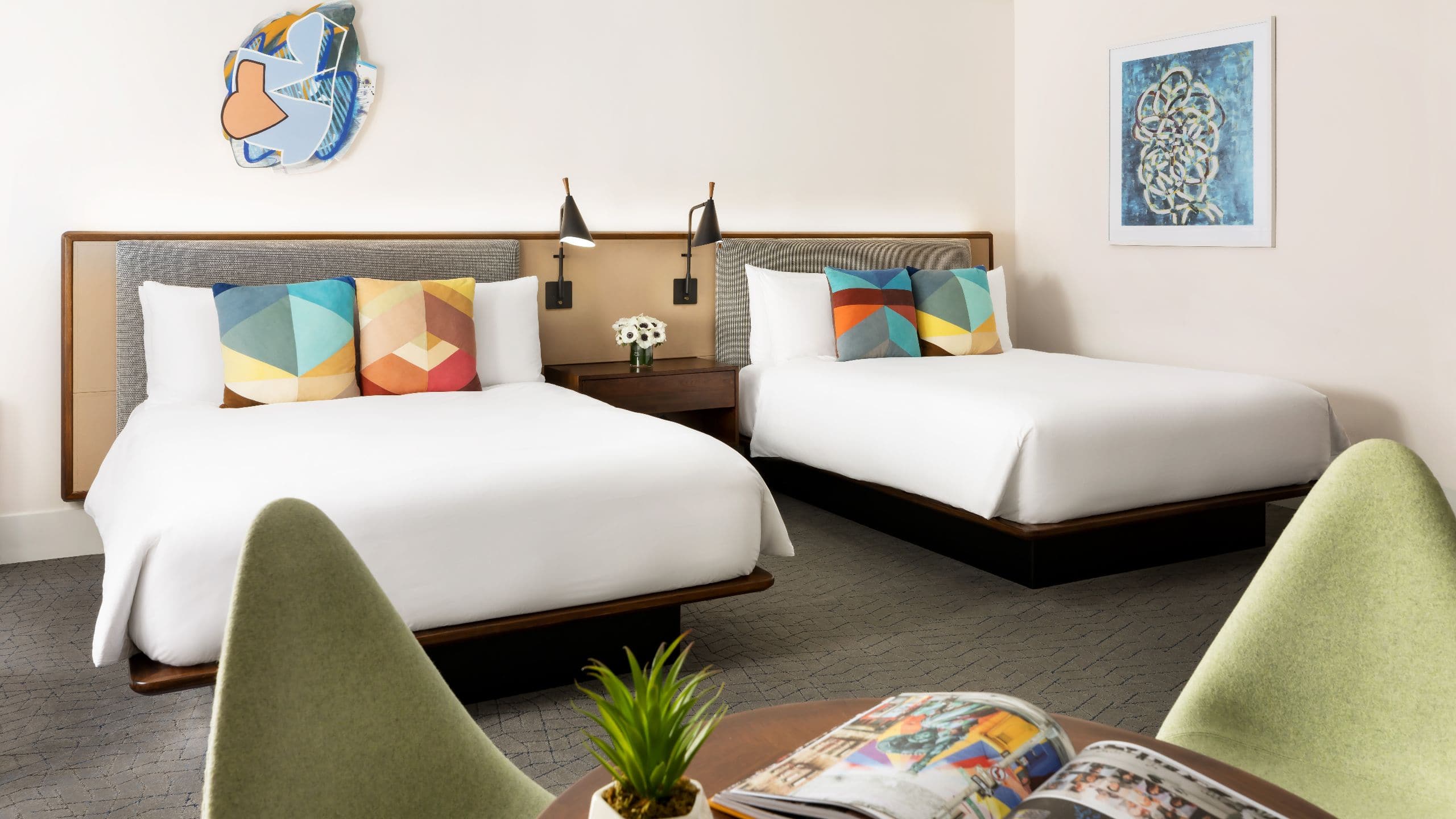 Hotel Seville NoMad Two Queen Beds Guestroom And Green Chairs