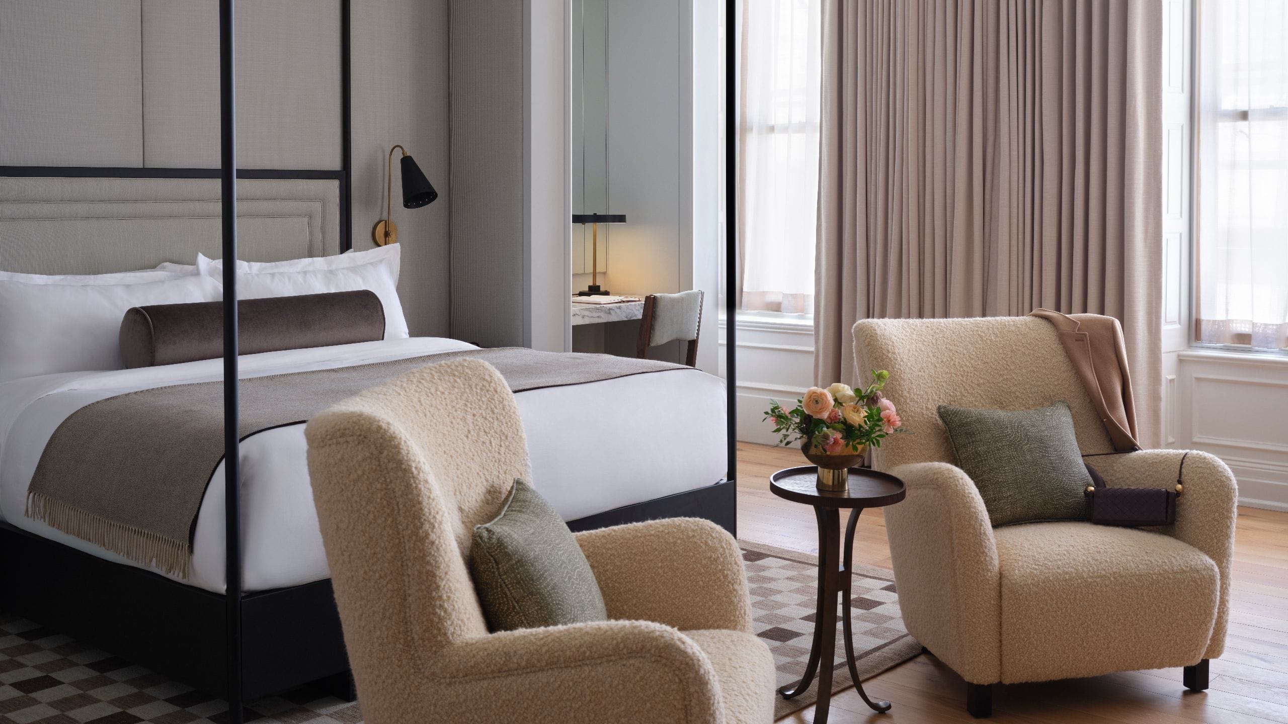 1/10 The Bellevue Hotel One Bedroom Suite Bed And Seating Detail
