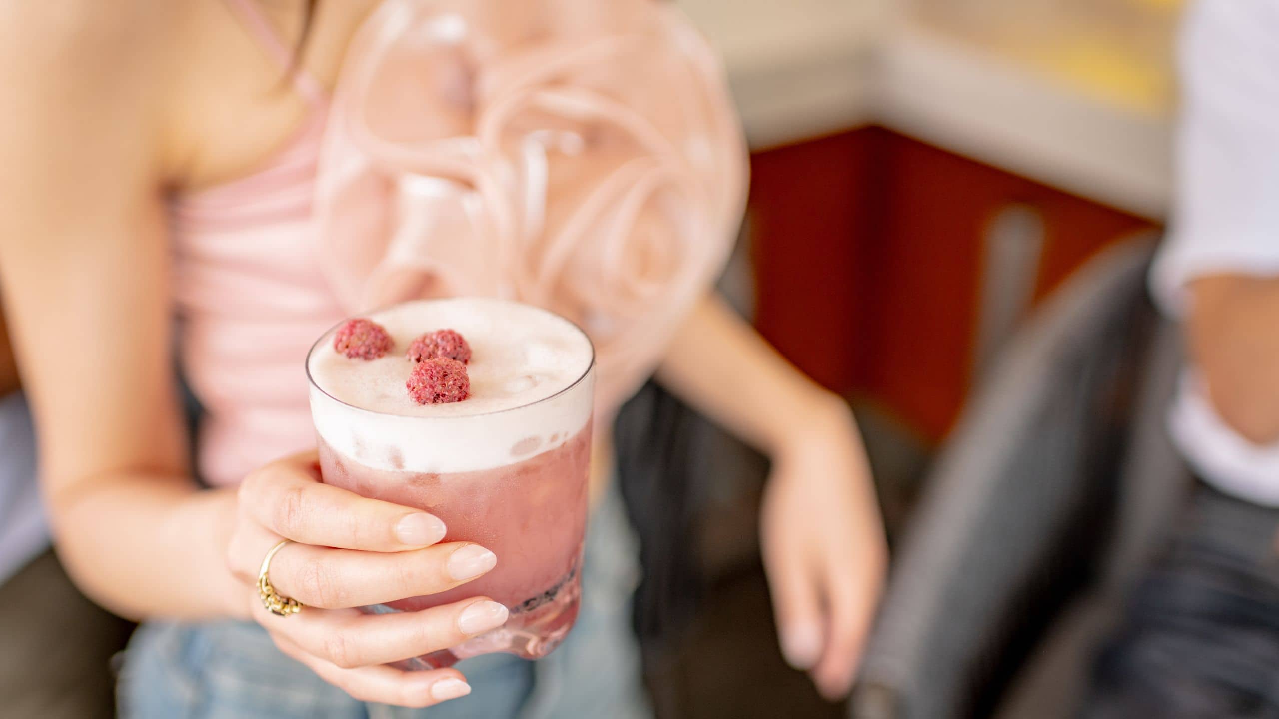 Andaz San Diego Guest Enjoying Cocktail Rooftop