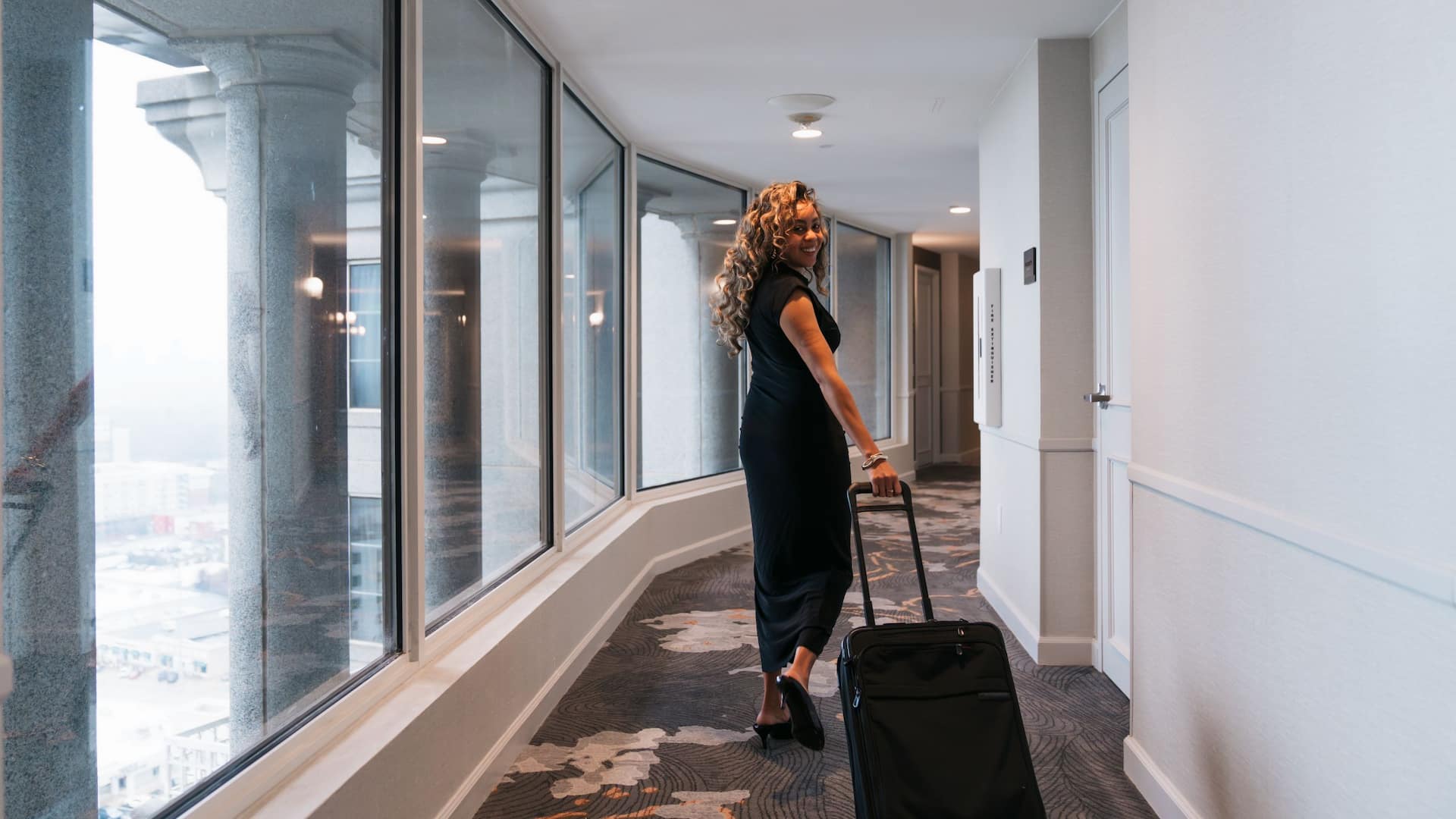 Grand Hyatt Atlanta in Buckhead Guest With Suitcase