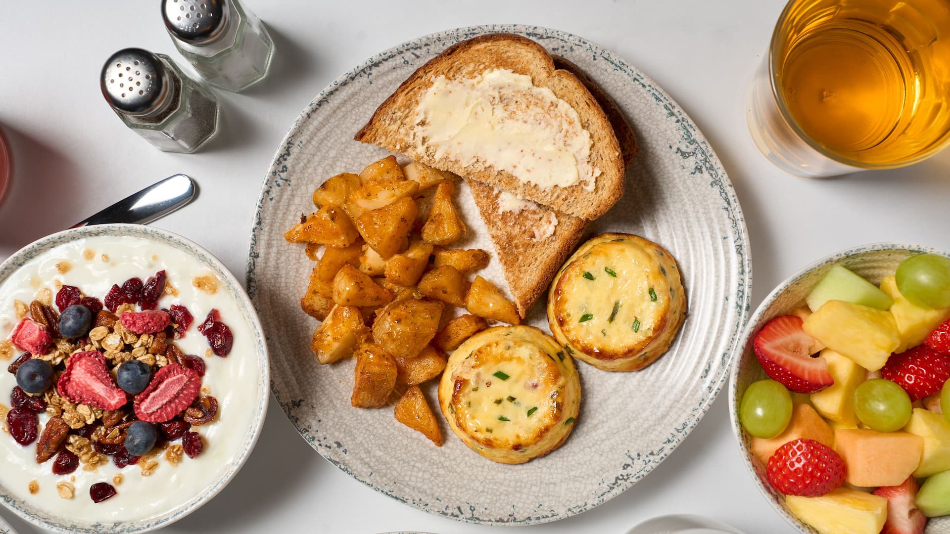 Hyatt Place HP_P0591 Breakfast Egg Bites With Potatoes Fruit And Yogurt Top View
