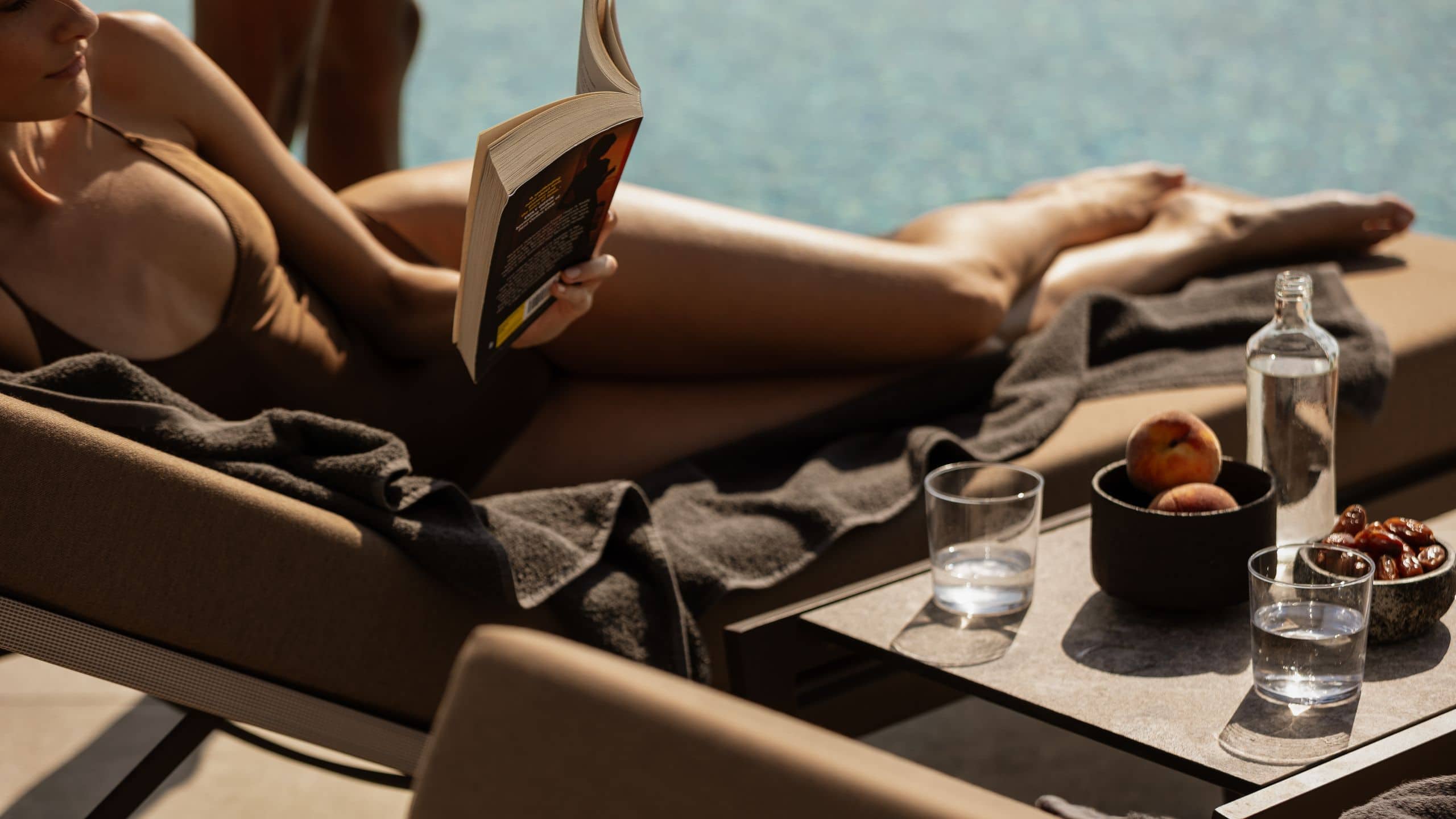 Zelia Halkidiki Hebe Pool Couple With Book And Snacks
