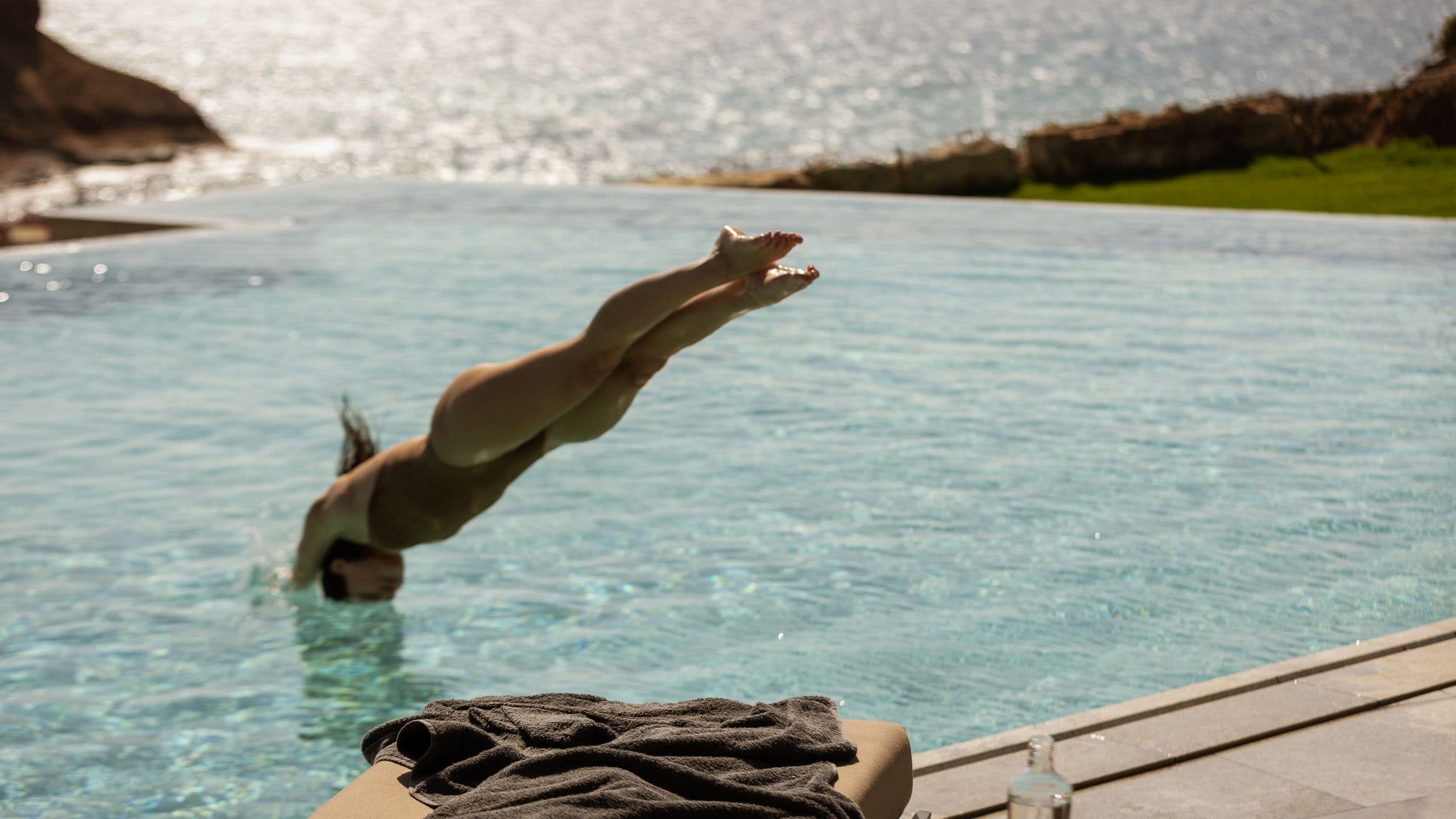 Zelia Halkidiki Hebe Pool Woman Jumping To The Water