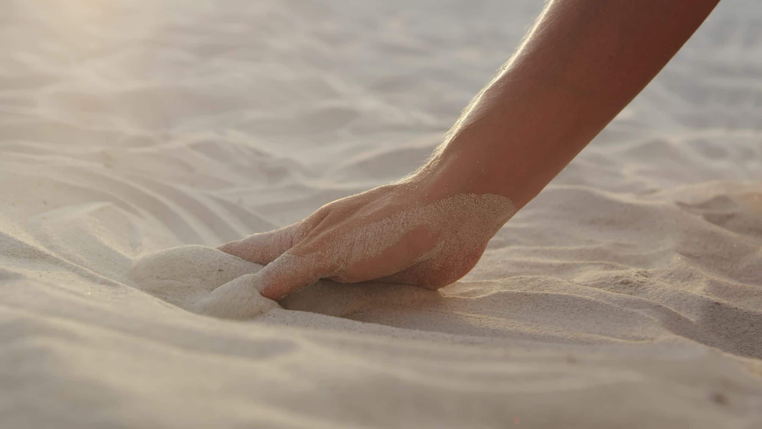 Sarena de Muro Resort Mallorca Female Hand Touching Sand