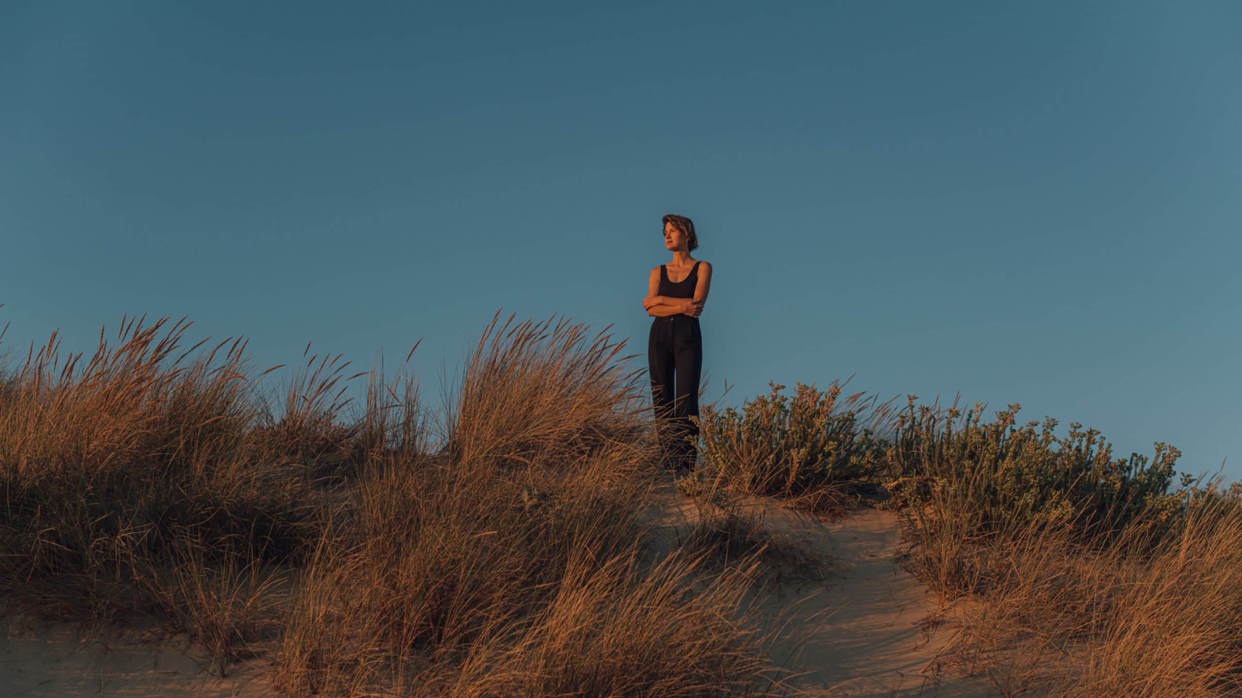 Sarena de Muro Resort Mallorca Woman In Black On Dune
