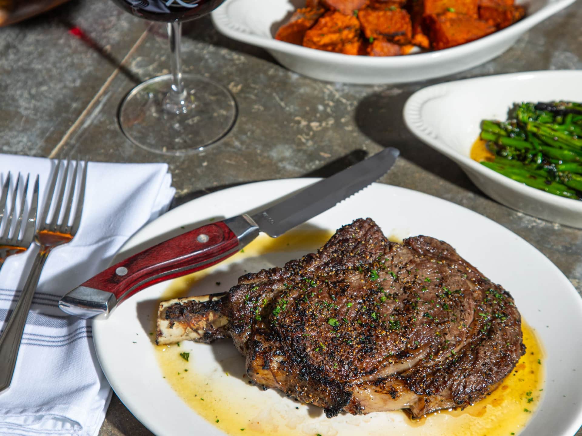 Hyatt Regency New Orleans Cowboy Steak With Sides Vertical