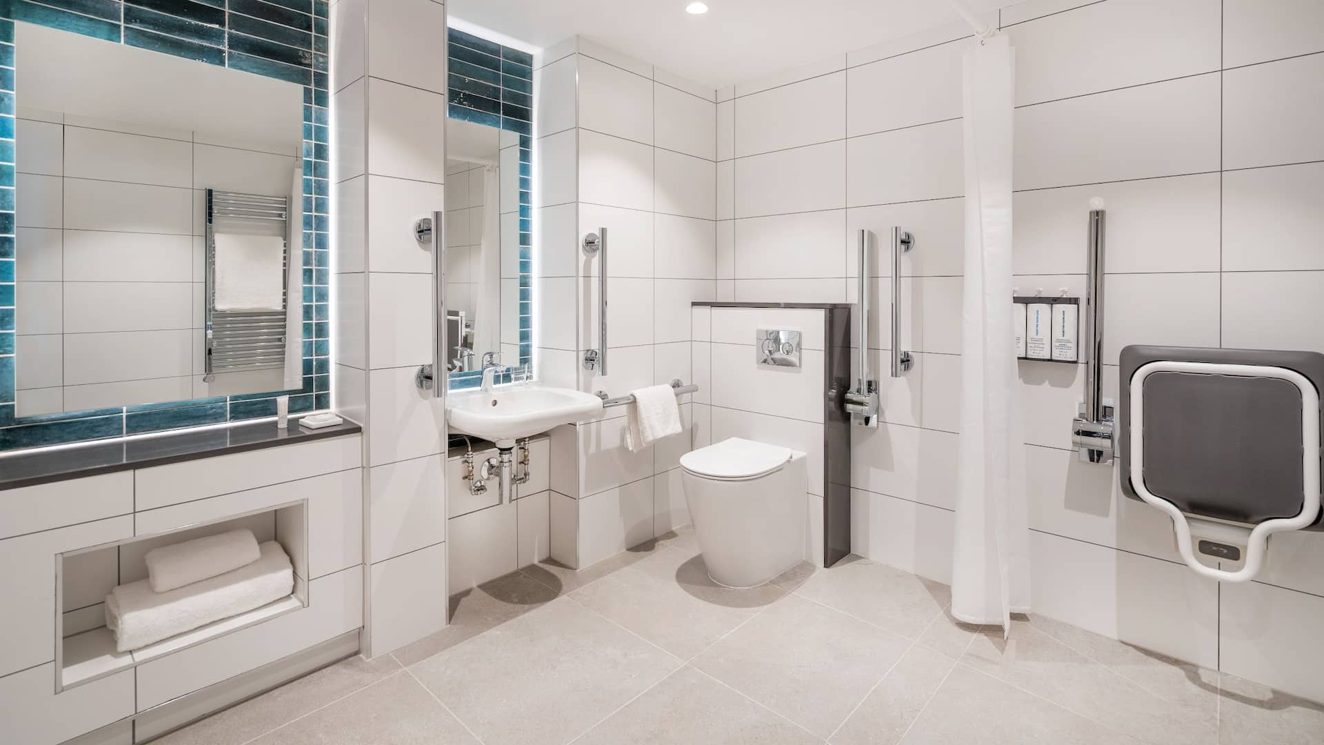 7 of 7 Hyatt House Leeds Accessible Bathroom Blue