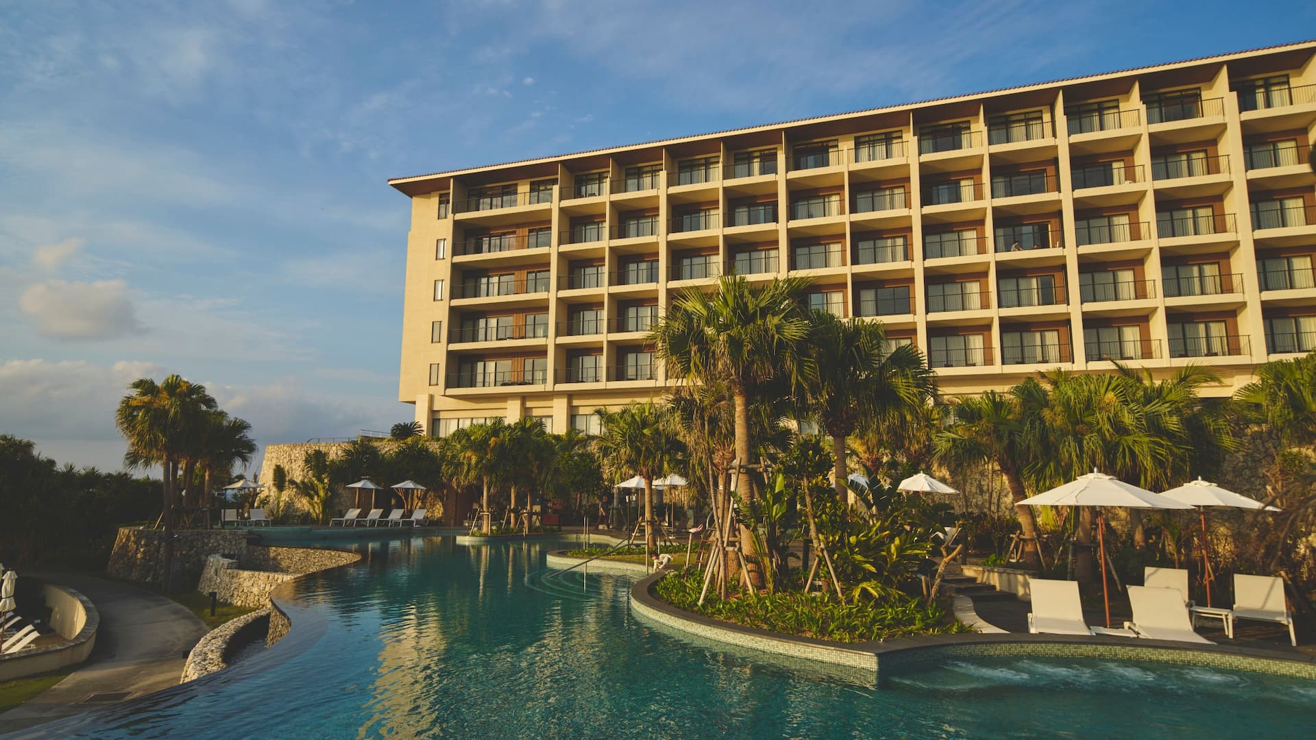 Hyatt Regency Seragaki Island, Okinawa Gusuku Pool Surrounded By Palm Trees