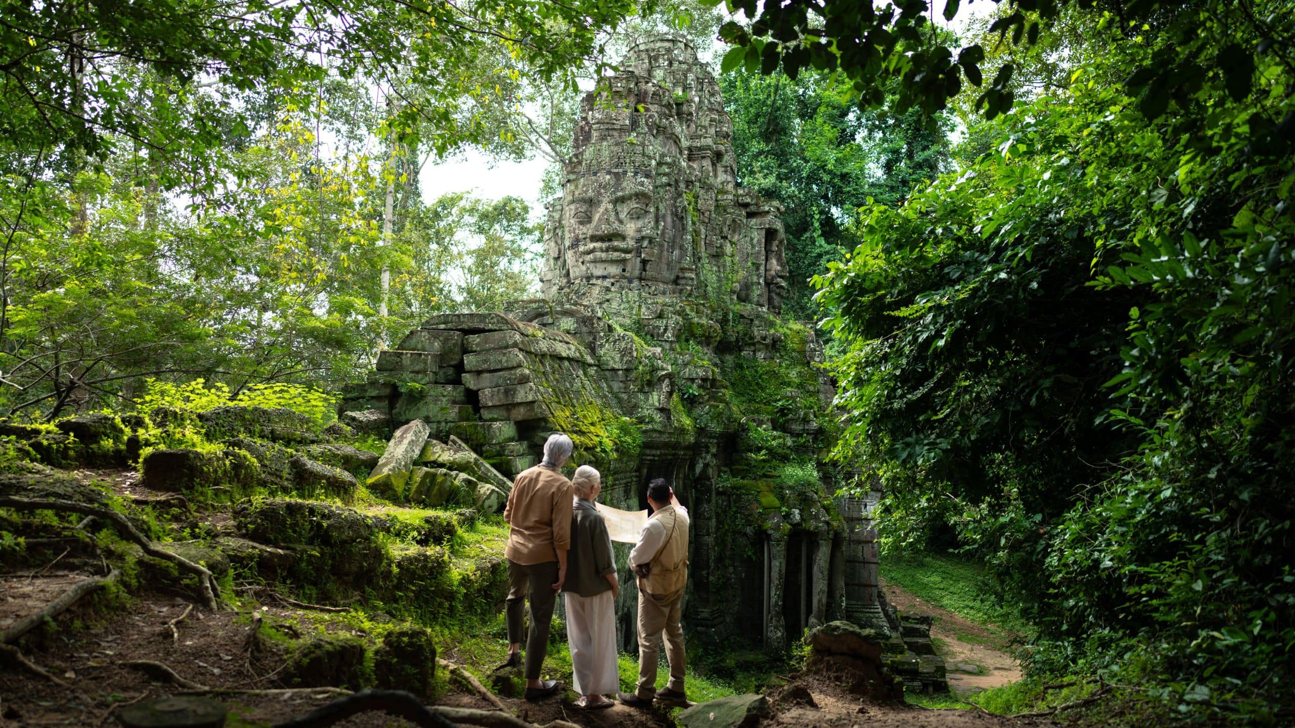 Park Hyatt Siem Reap Couple Viewing The Three Temple Adventure Tour Bayon Gate