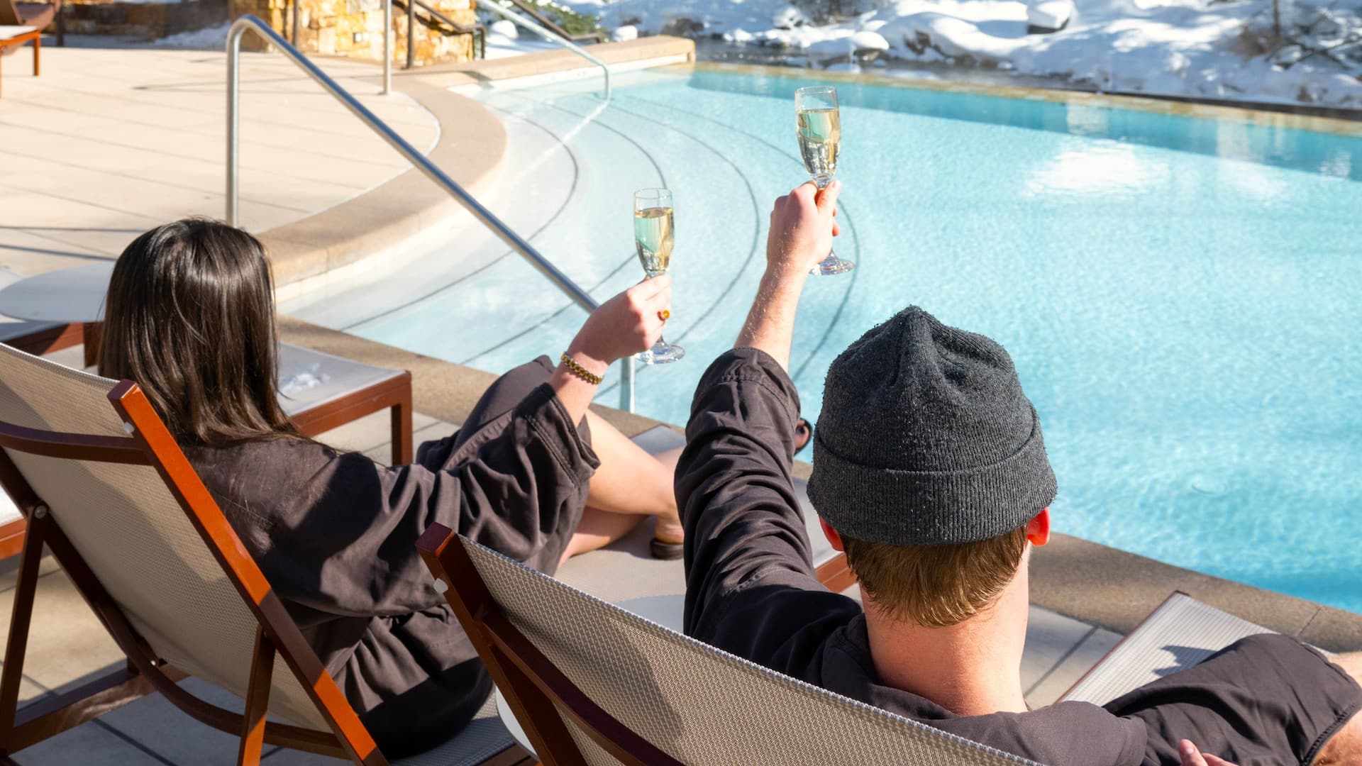 Grand Hyatt Vail Guests with Champagne Sitting by Outdoor Pool