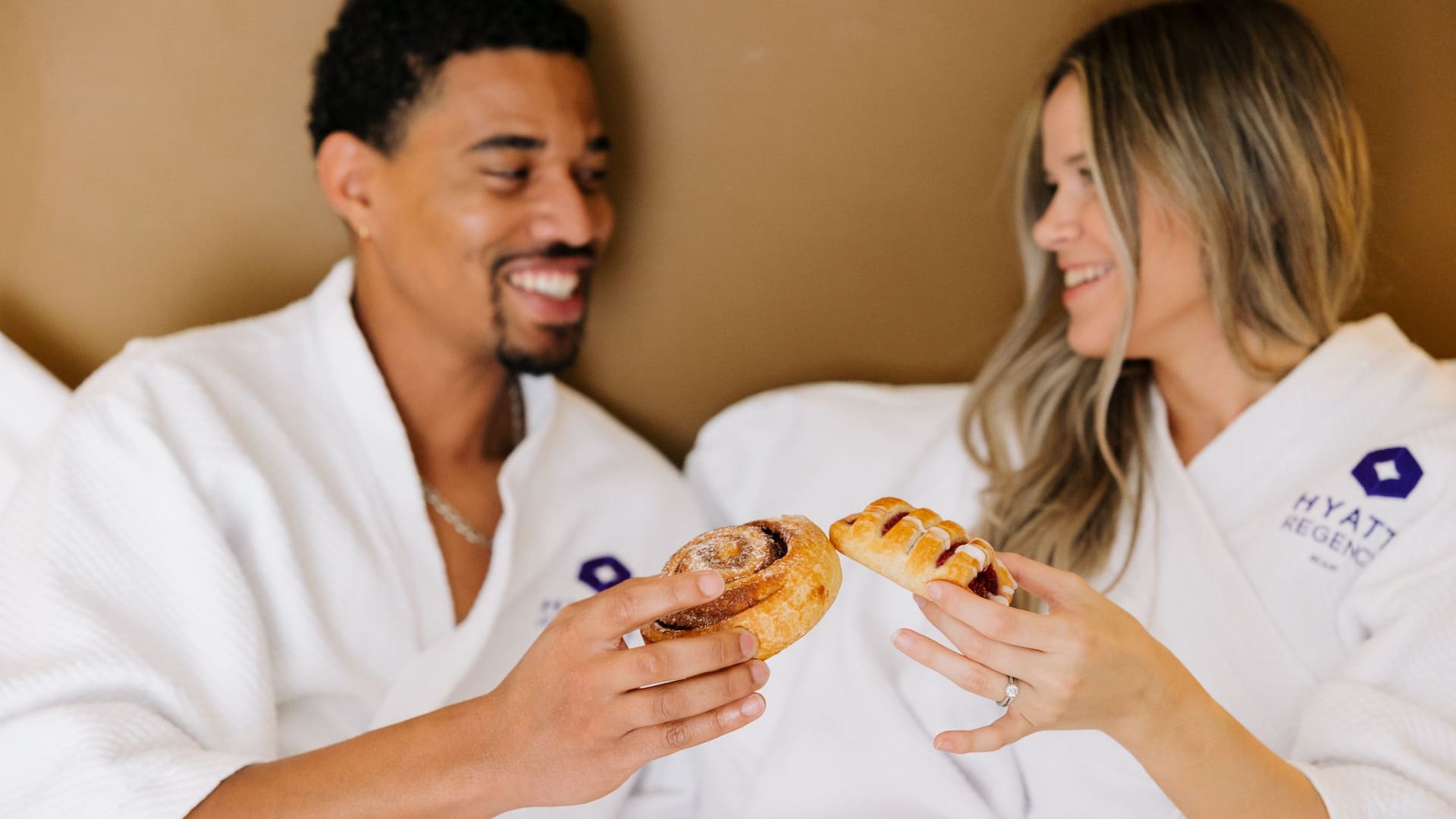 1 of 4 Hyatt Regency Miami In Room Amenities Couple Robes Baked Goods Cheers