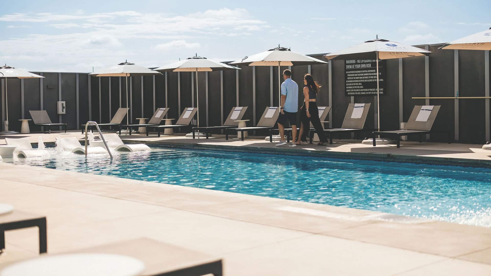 Hyatt Regency Frisco - Dallas Pool Couple Walking