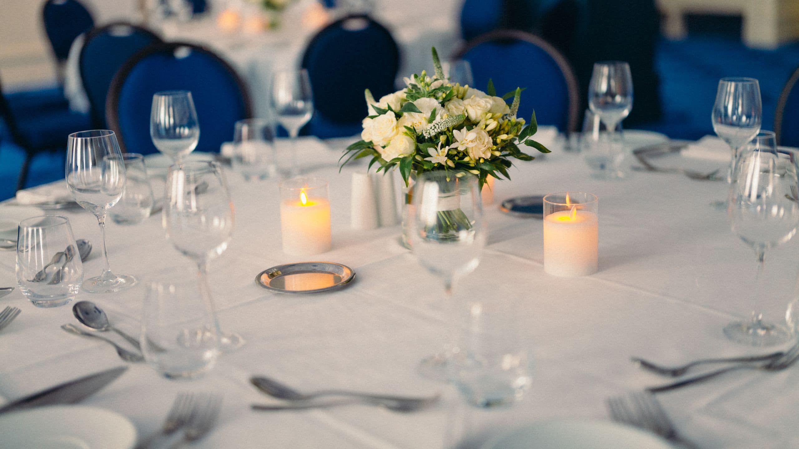 3 of 3 Hôtel Martinez Flower Arrangement And Candle Setup