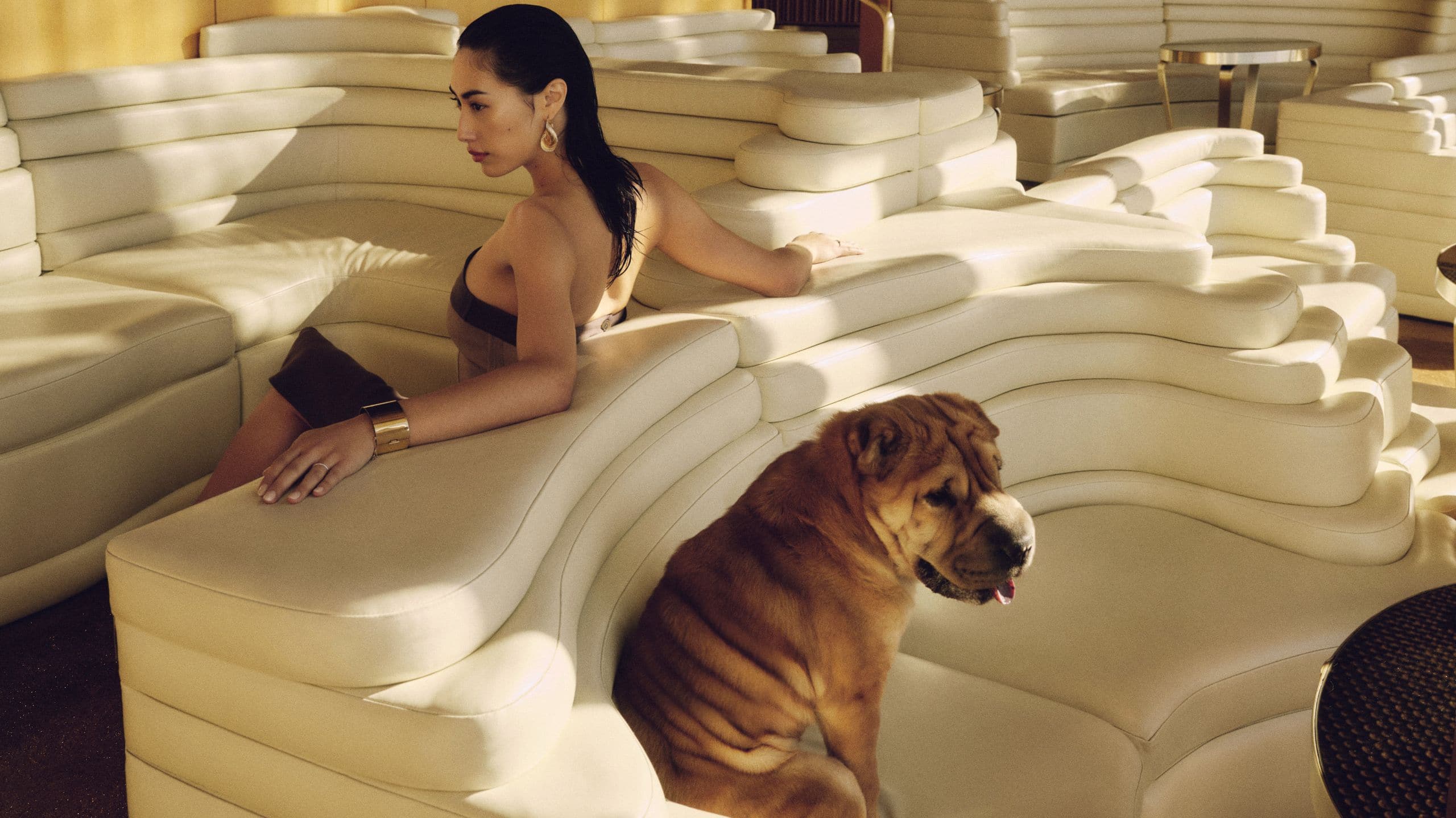 The Standard, High Line Woman And Dog Relaxing