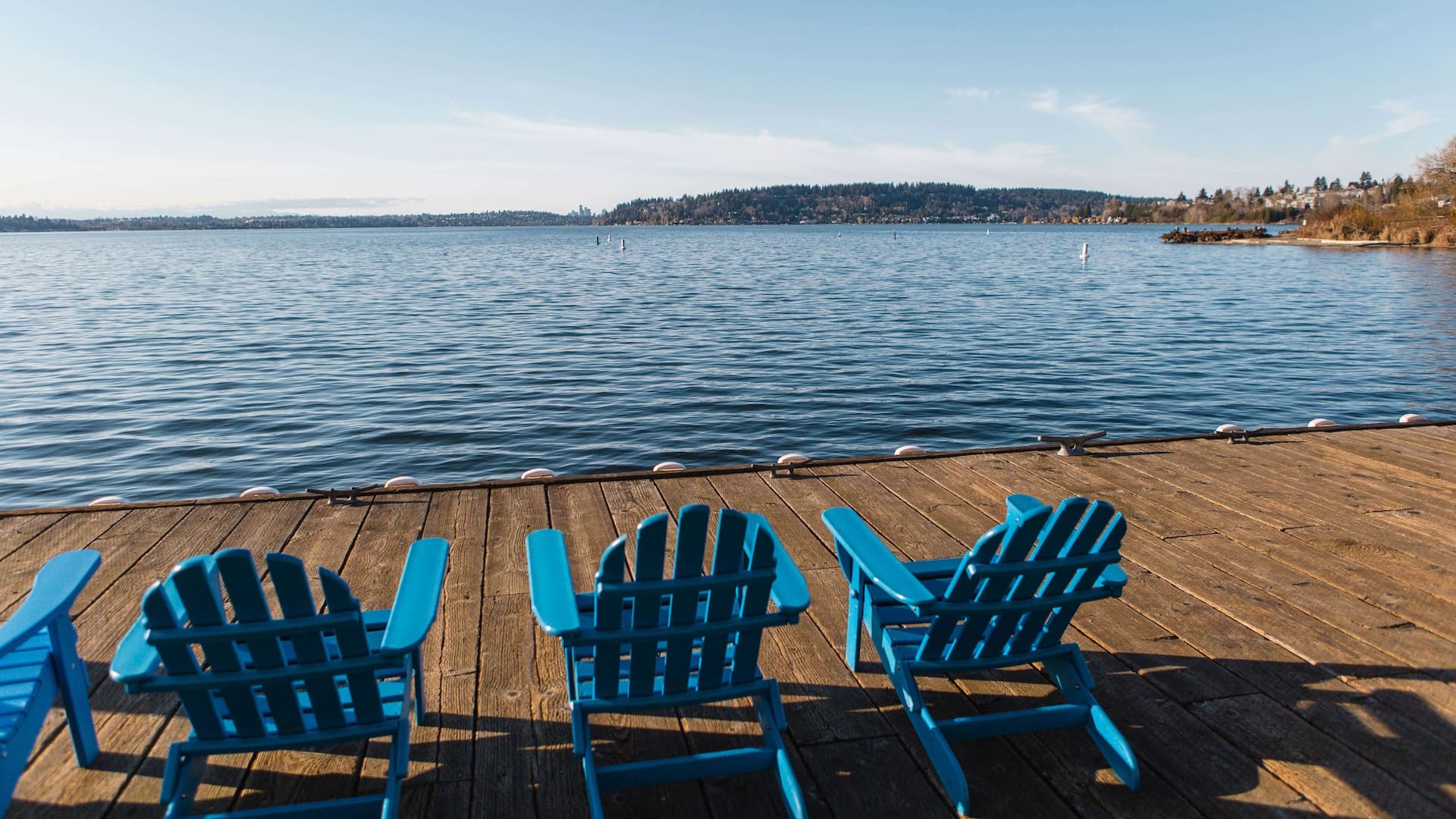 Hyatt Regency Lake Washington at Seattle's Southport Blue Chairs On Dock