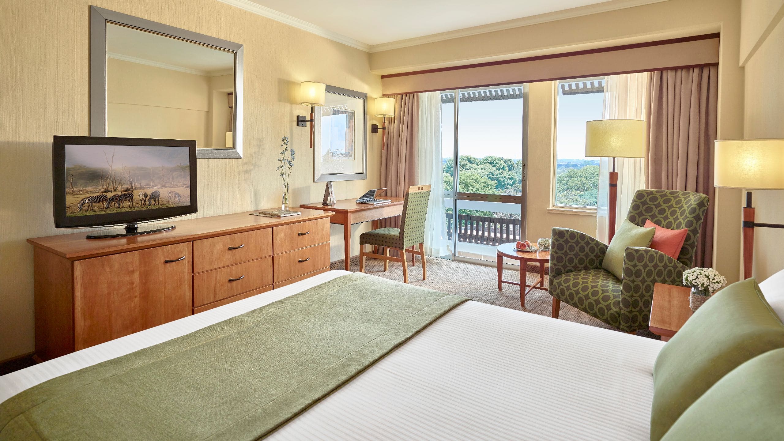1 of 1 The Pamodzi Hotel Guestroom King Bed Deluxe With Tv