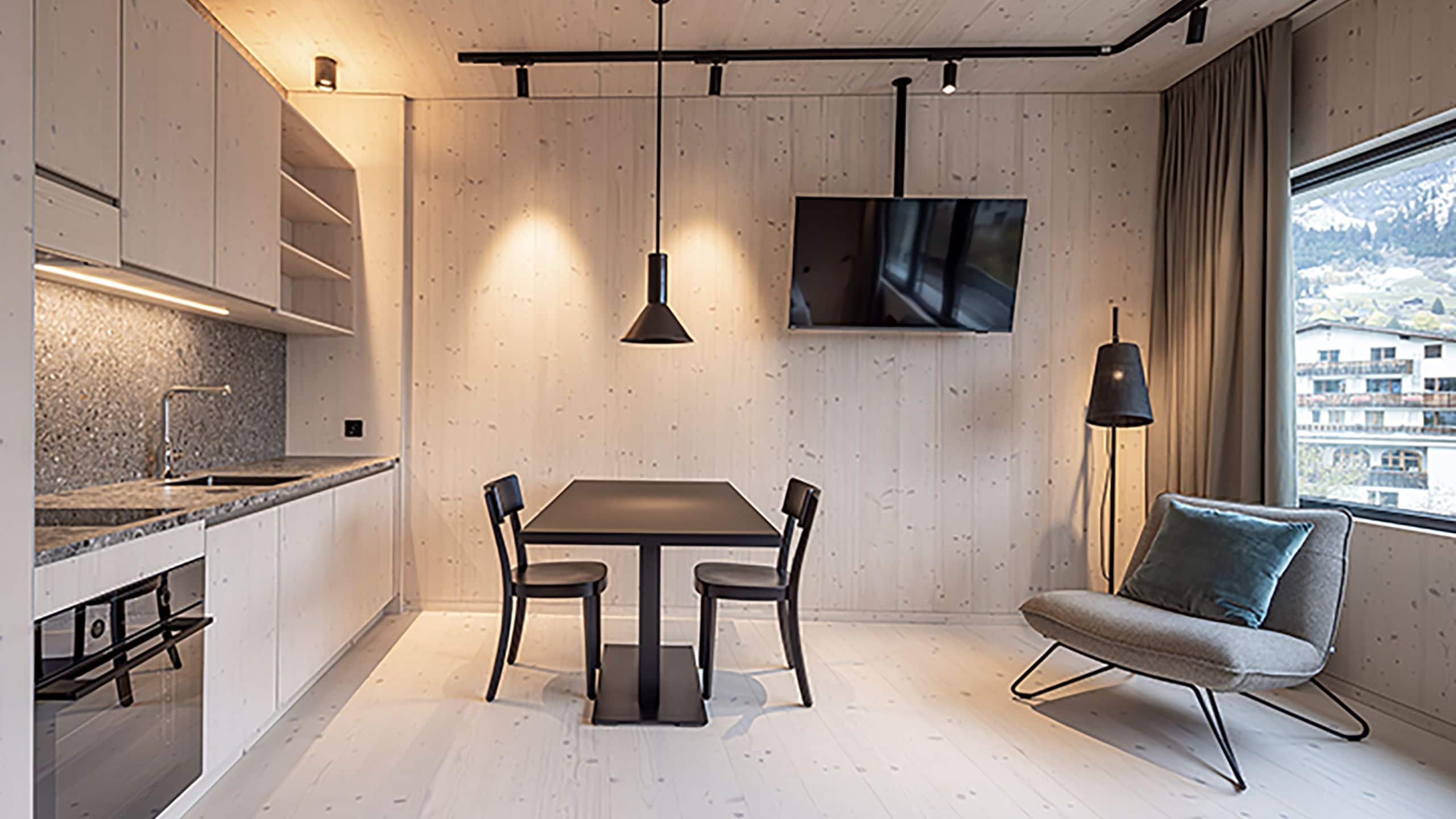 Me and All Hotel Flims One King Bed Studio Table