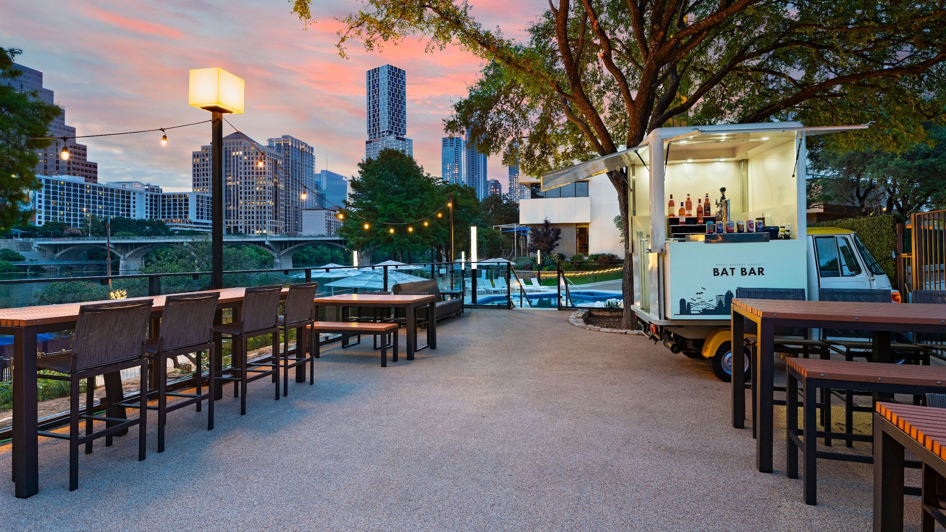 1 of 2 Hyatt Regency Austin Pool Bat Bar Dusk