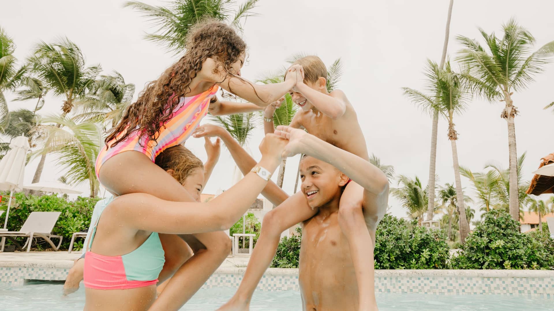 Hyatt Regency Grand Reserve Puerto Rico Kids Playing By The Pool